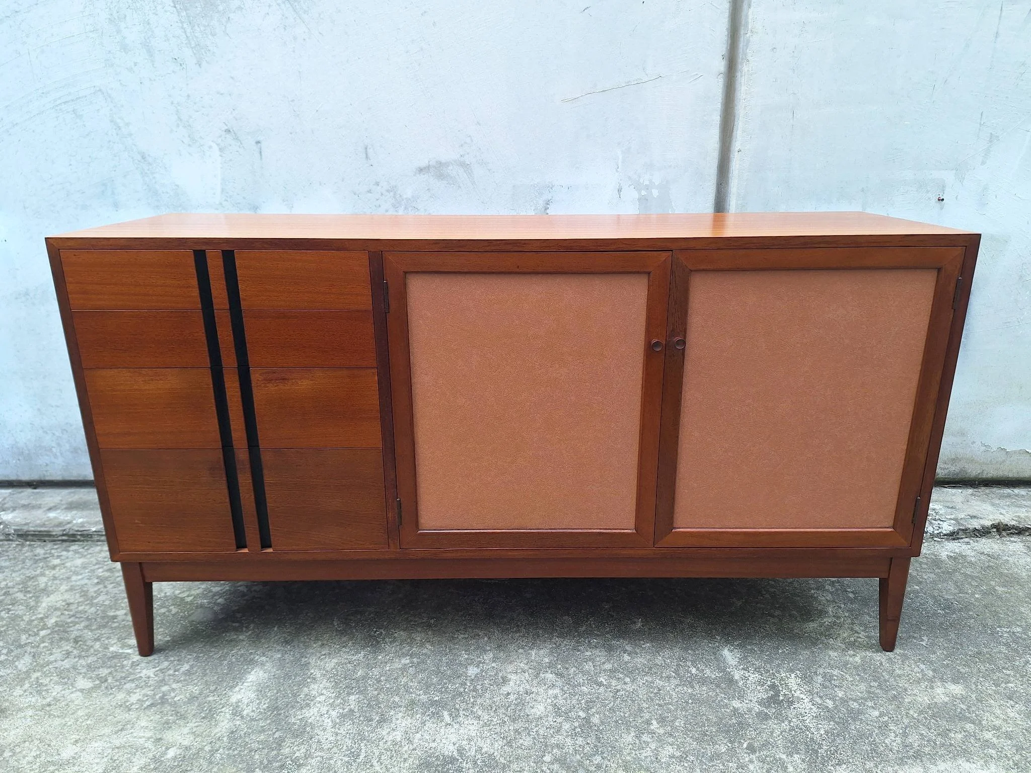Professionally restored mid century timber sideboard with four drawers, tan vinyl inlay cabinet doors and adjustable shelving.