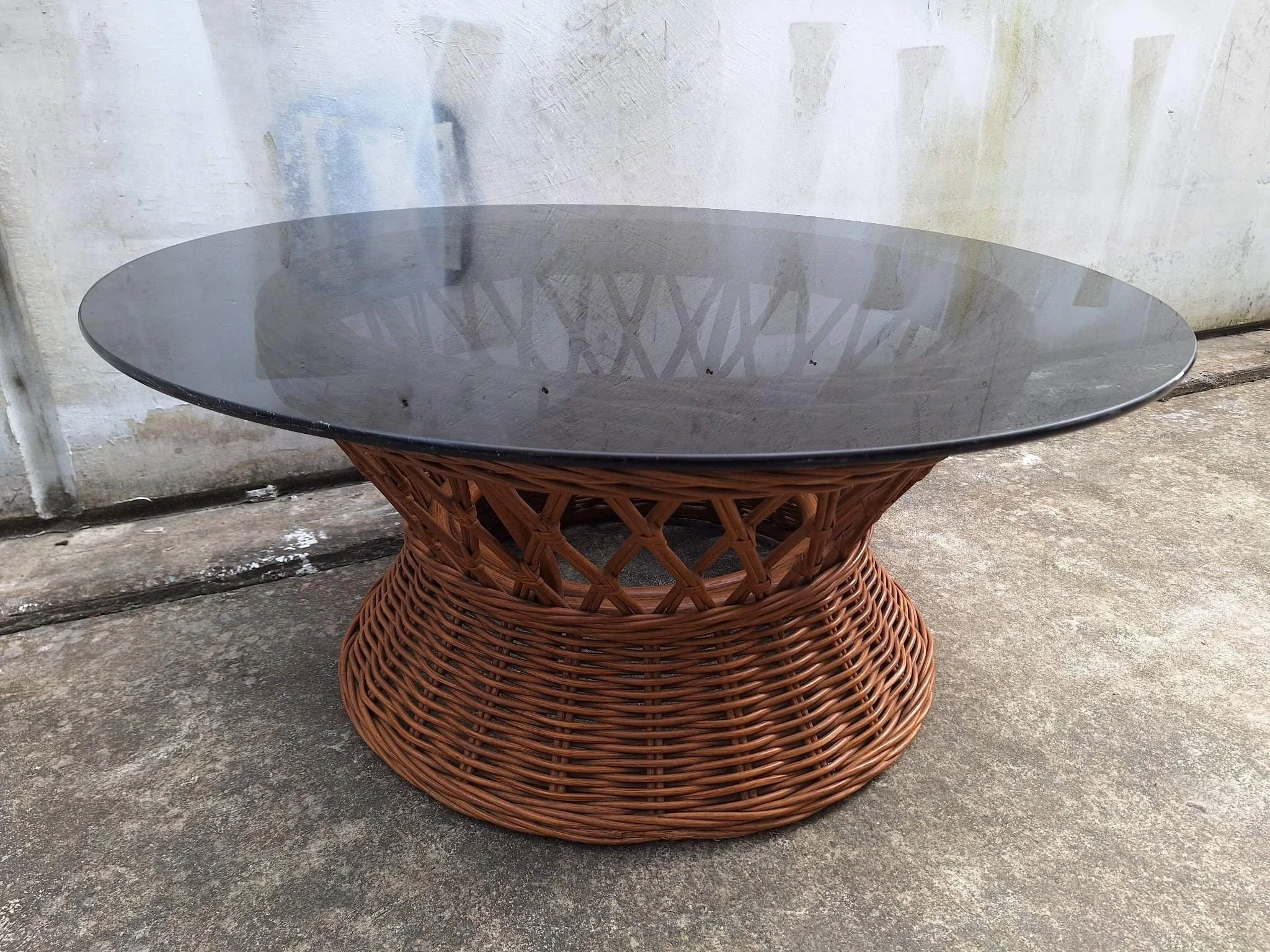 Vintage cane coffee table with smoked glass top