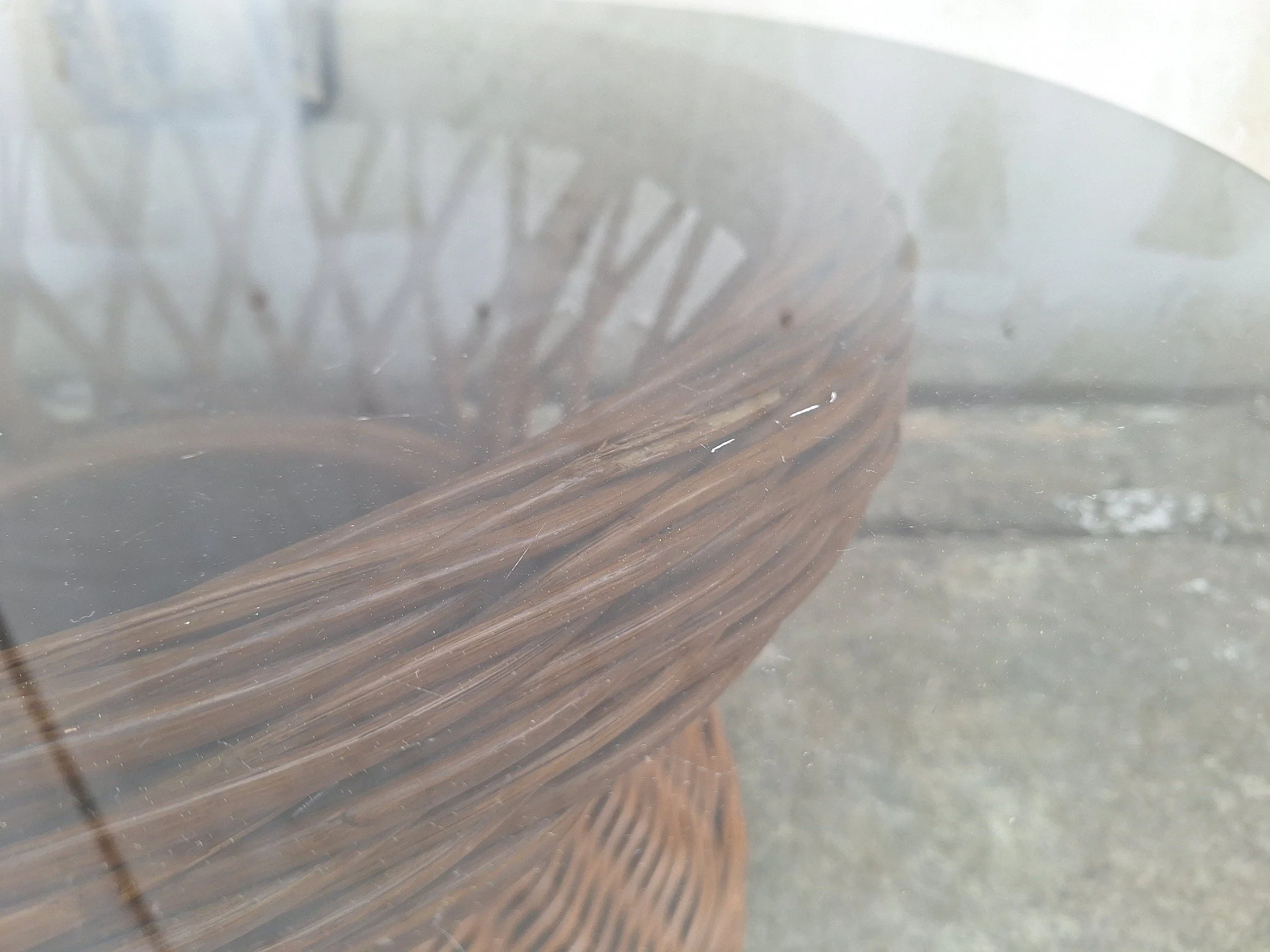 Vintage cane coffee table with smoked glass top