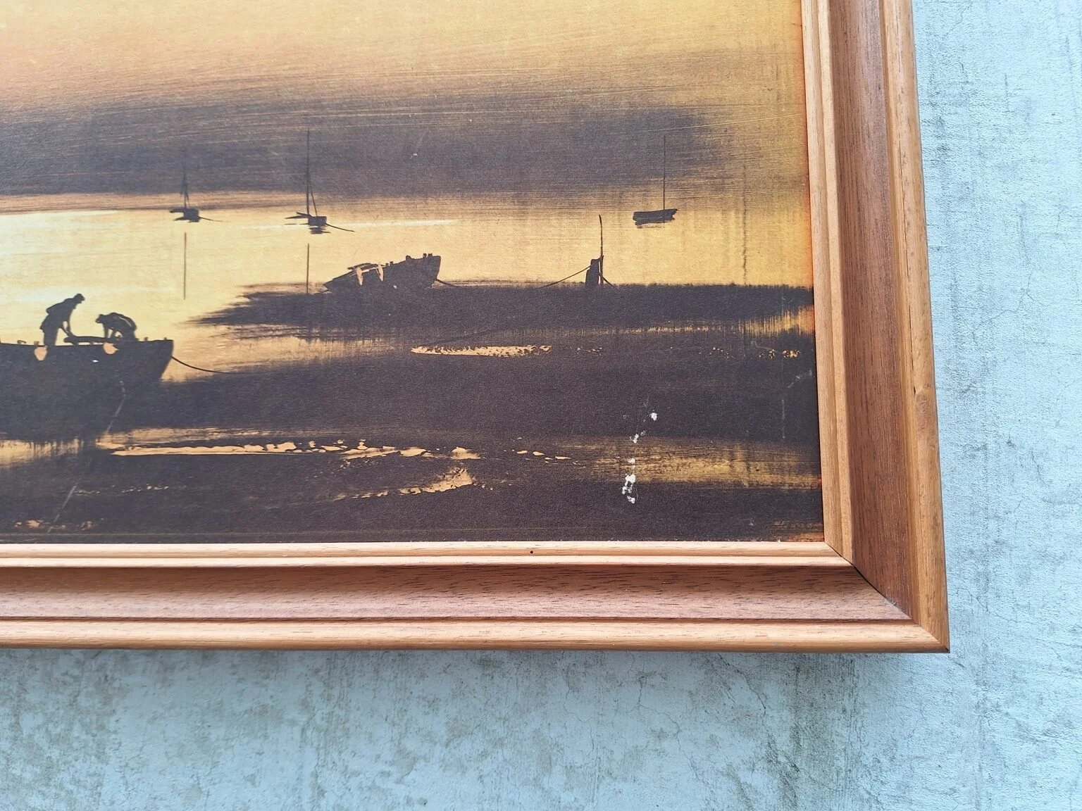 Condition detail showing age-related surface marks near the lower-right area of the vintage harbour print.