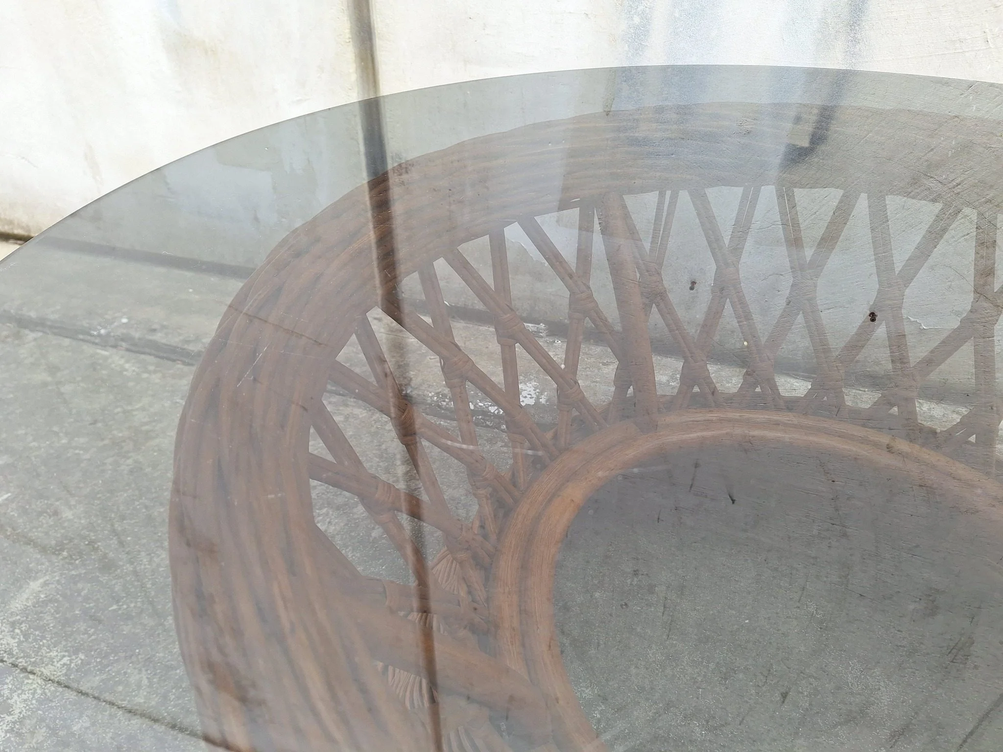 Vintage cane coffee table with smoked glass top