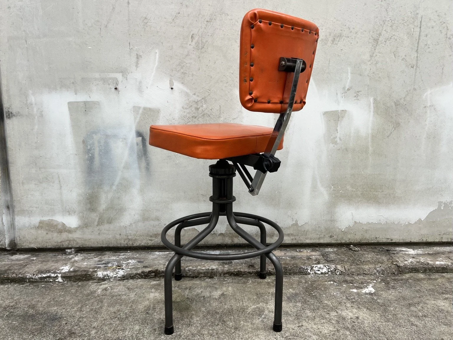 kush interiors industrial adjustable stool orange 02