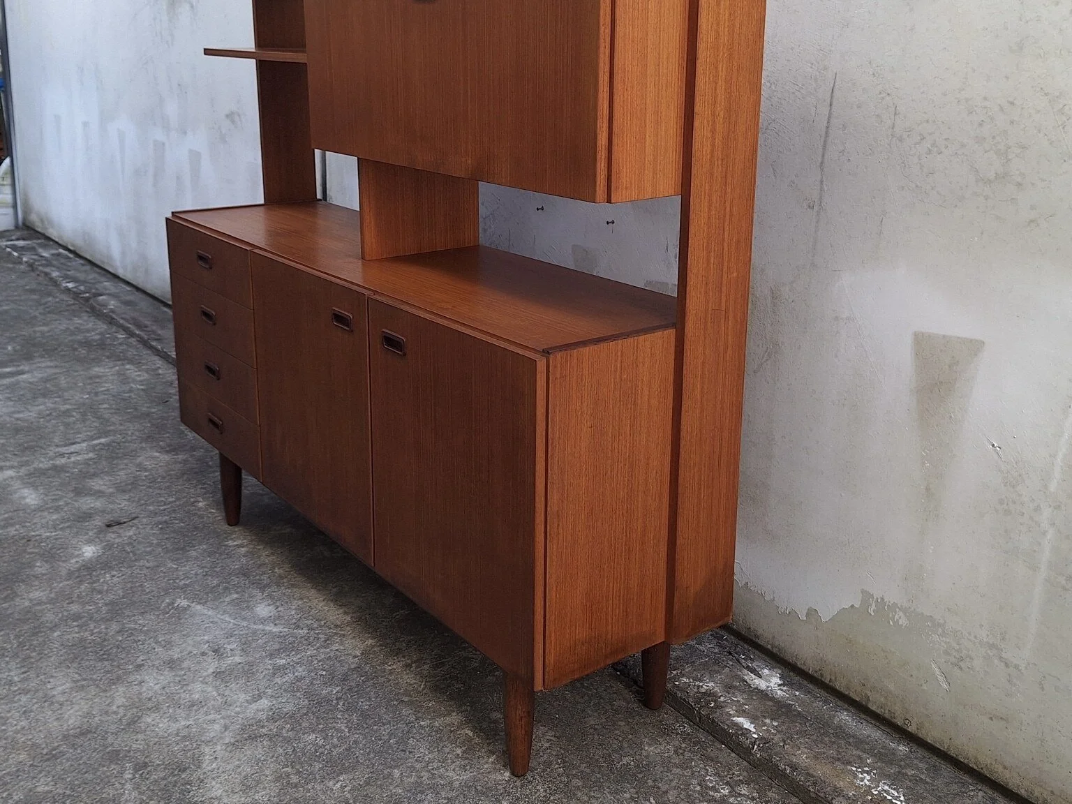 Right-side view showing the depth and freestanding frame of the vintage wall unit