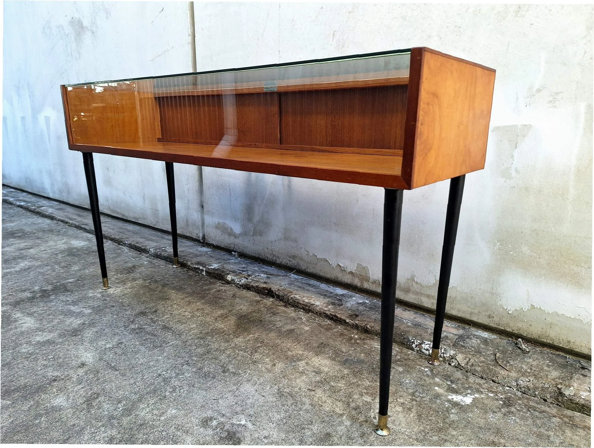 mid-century glass display cabinet angle