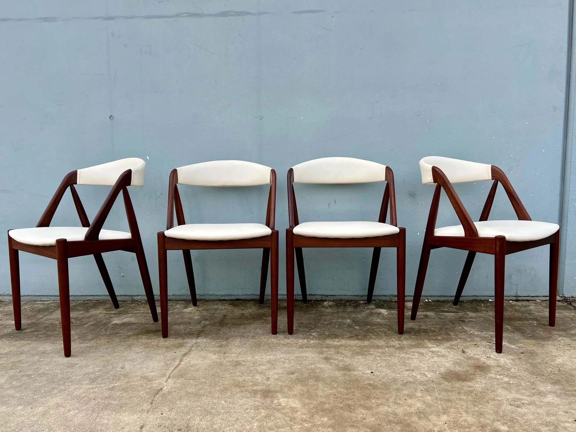 1960s-kai-kristiansen-model-31-rosewood-dining-chairs-1.jpg