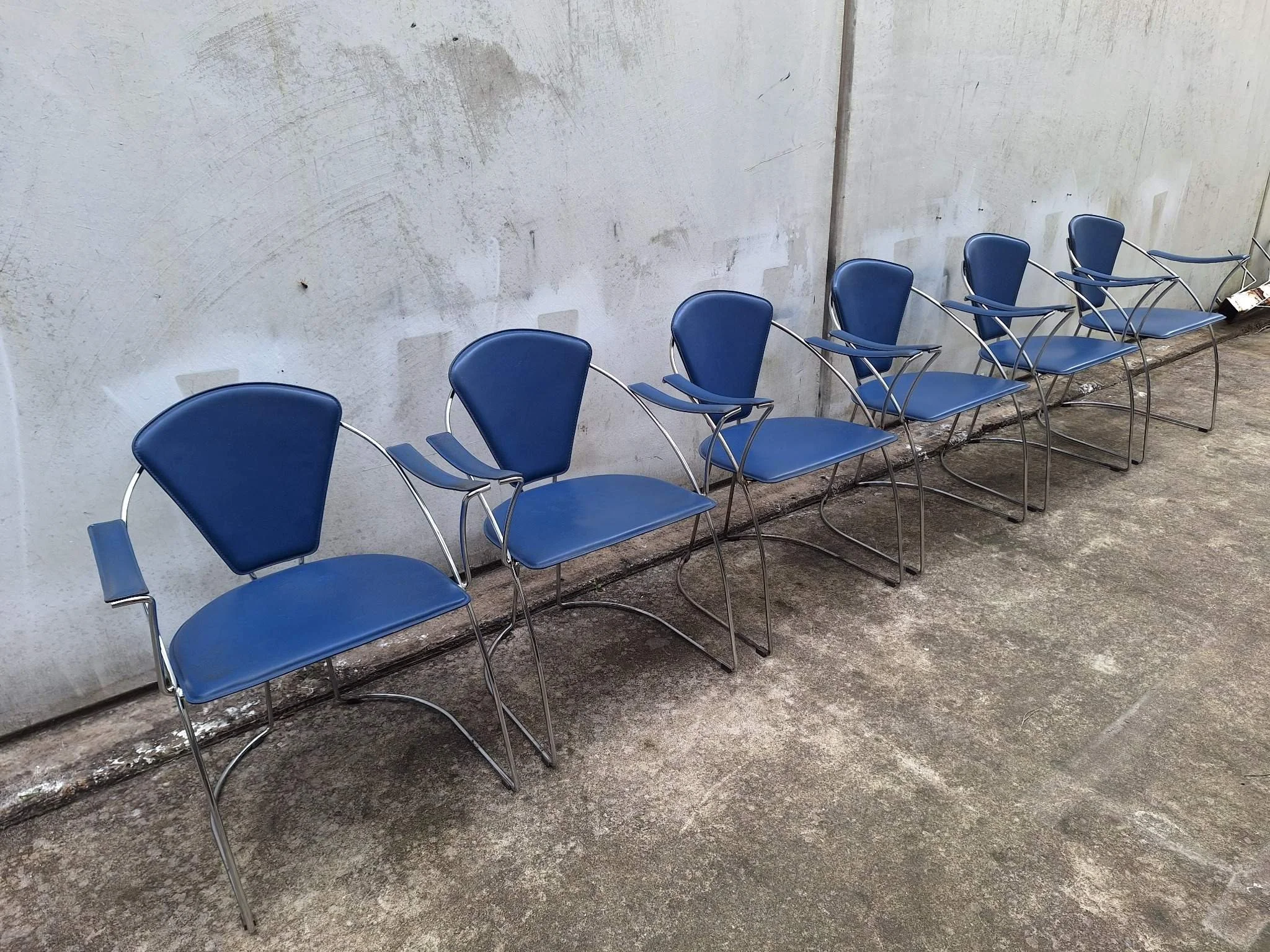 postmodern blue chrome dining chairs lineup