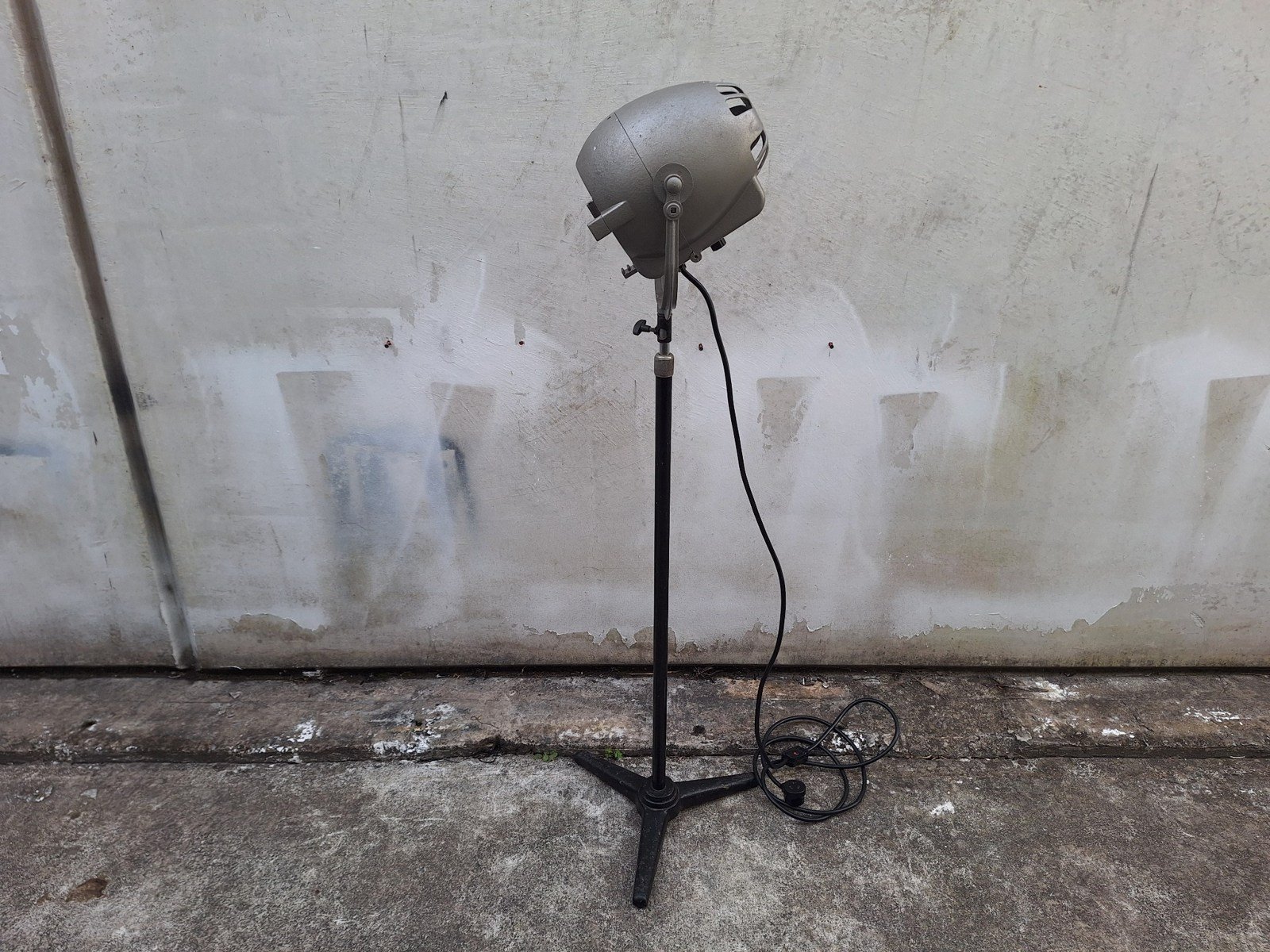 Rear full view of lamp No. 2 showing its housing, stand and power cable.