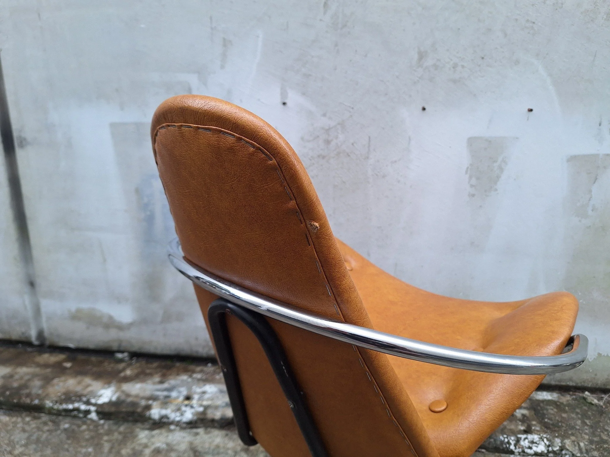 Detail of upholstery repair on backrest