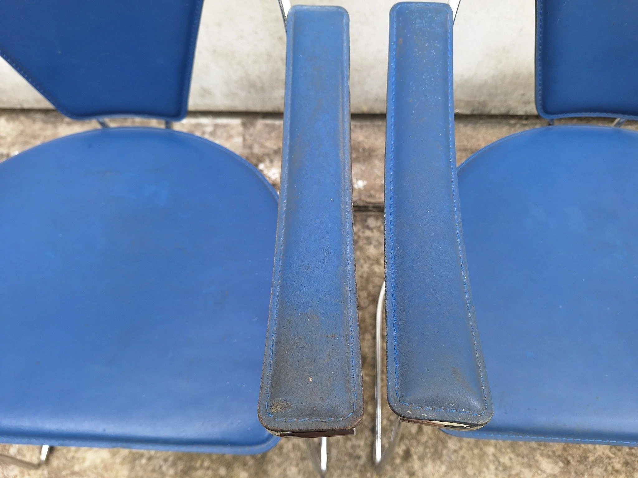 postmodern blue chrome dining chairs arm detail