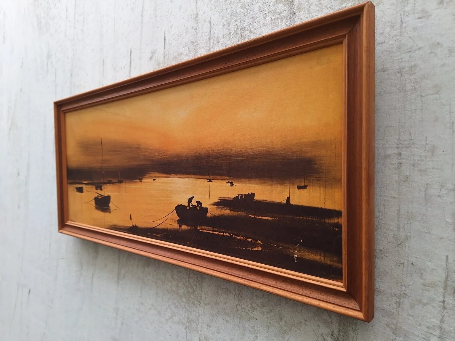 Right profile view of the framed harbour print showing its warm-toned sailing-boat composition.