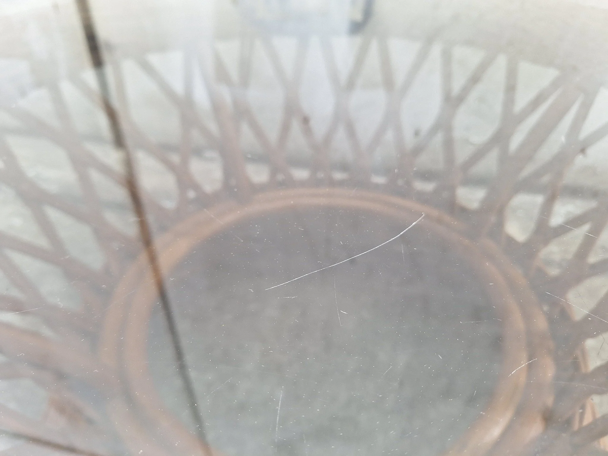 Vintage cane coffee table with smoked glass top