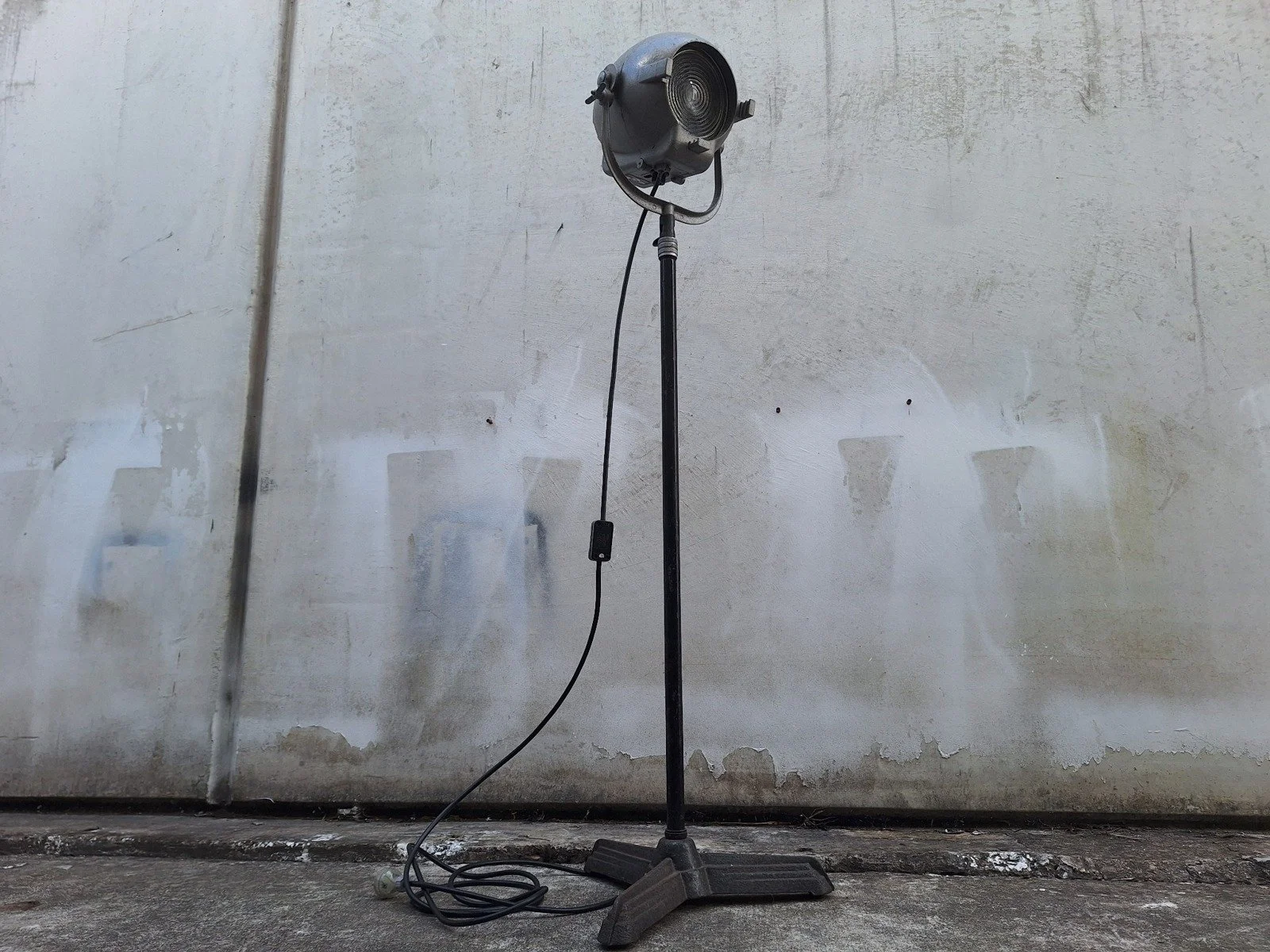 Alternate full view of lamp No. 1 showing its grey theatre light housing and tall stand.