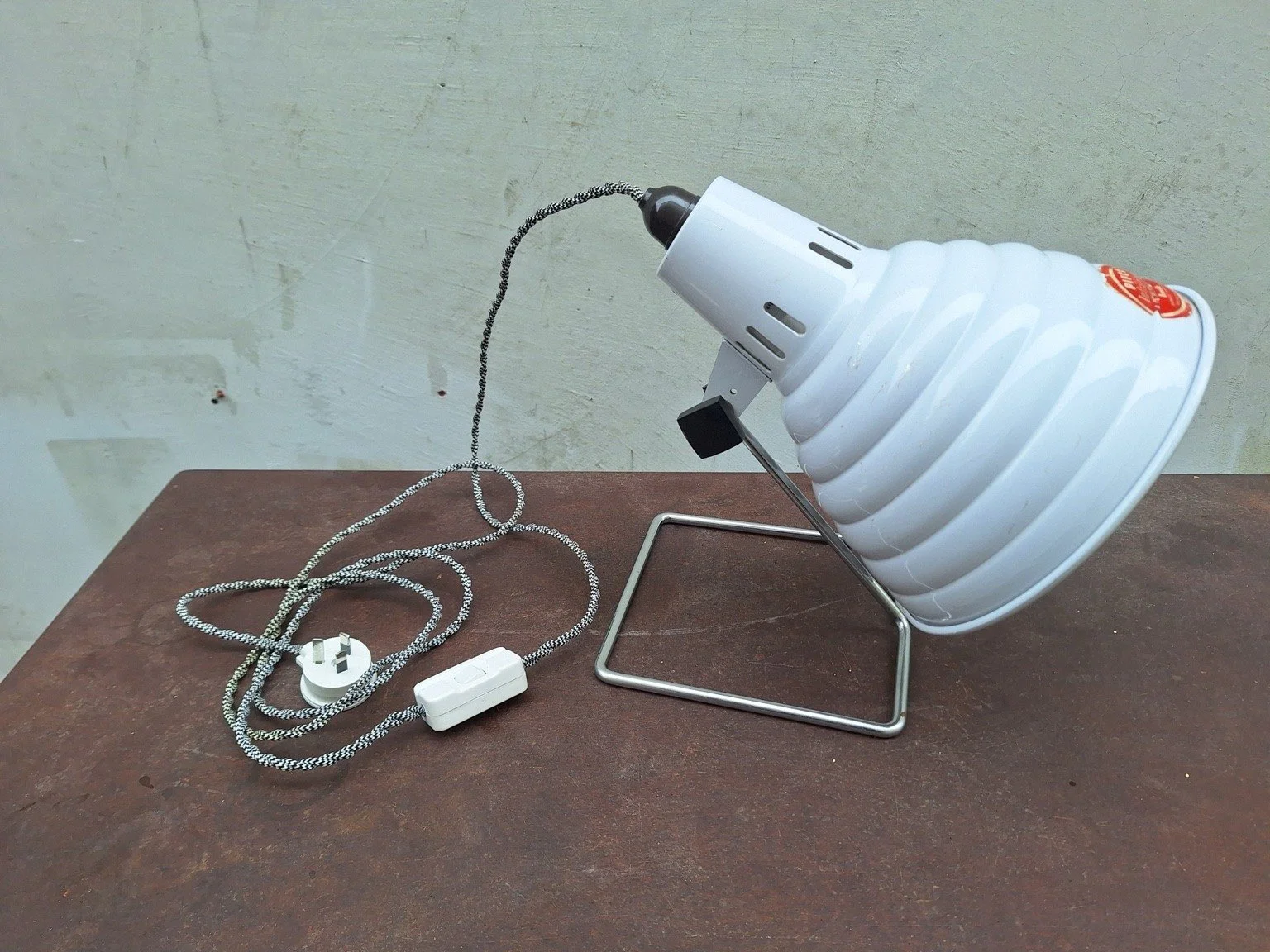 Pifco lamp with patterned cord, inline switch and plug on tabletop.