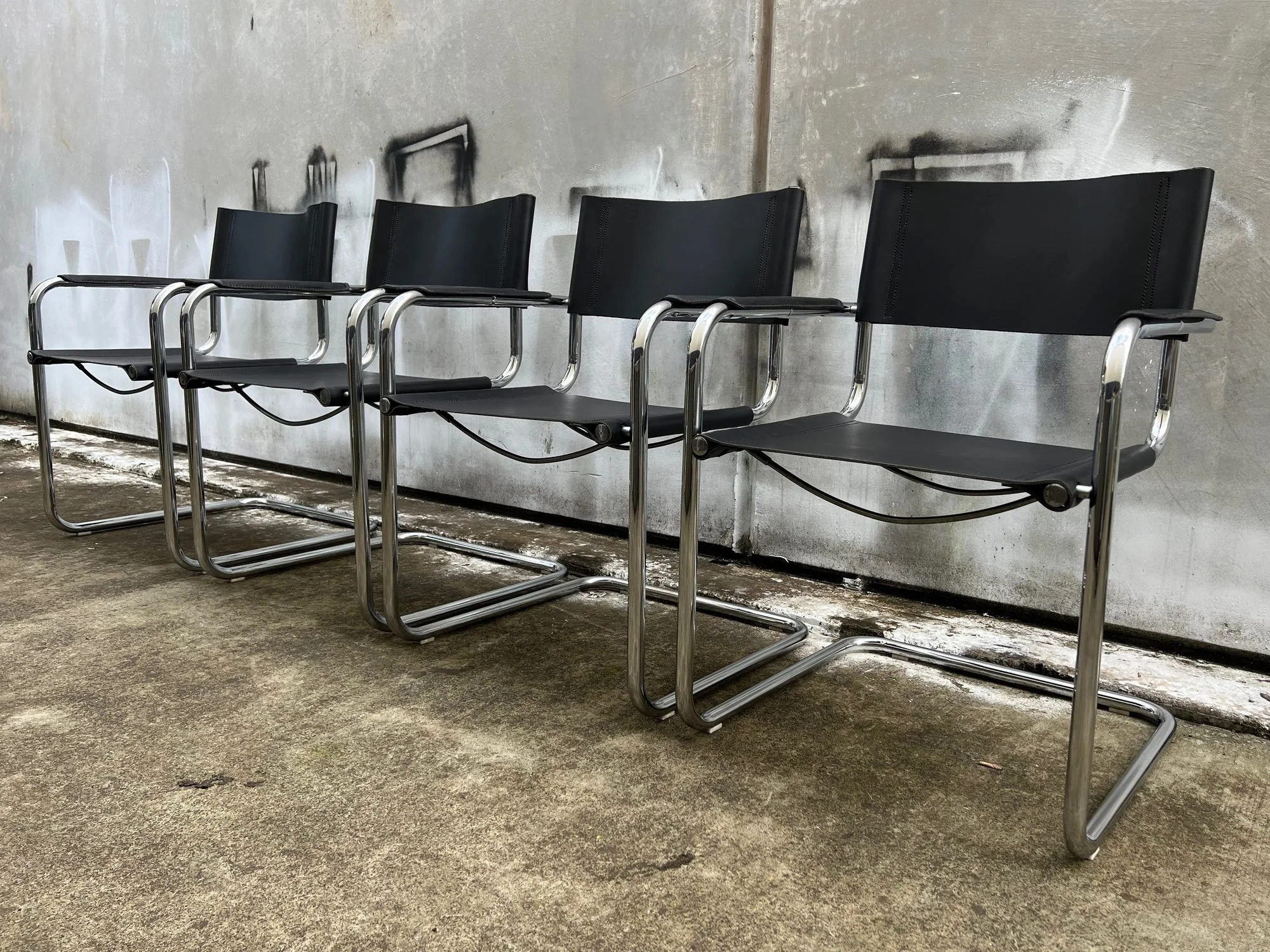 set-of-four-mart-stam-style-cantilever-leather-chairs-2.jpg