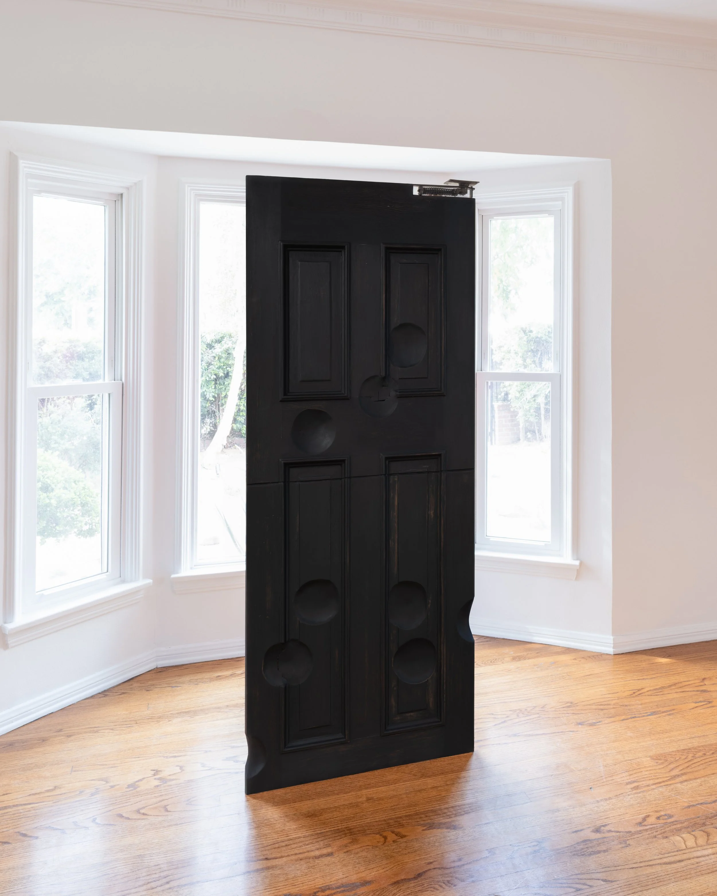 Zenobia Lee "Melancholia," 2026 Ebonized pine, steel stand 79 1/2 x 25 x 1 1/2 in (202 x 64 x 4 cm)