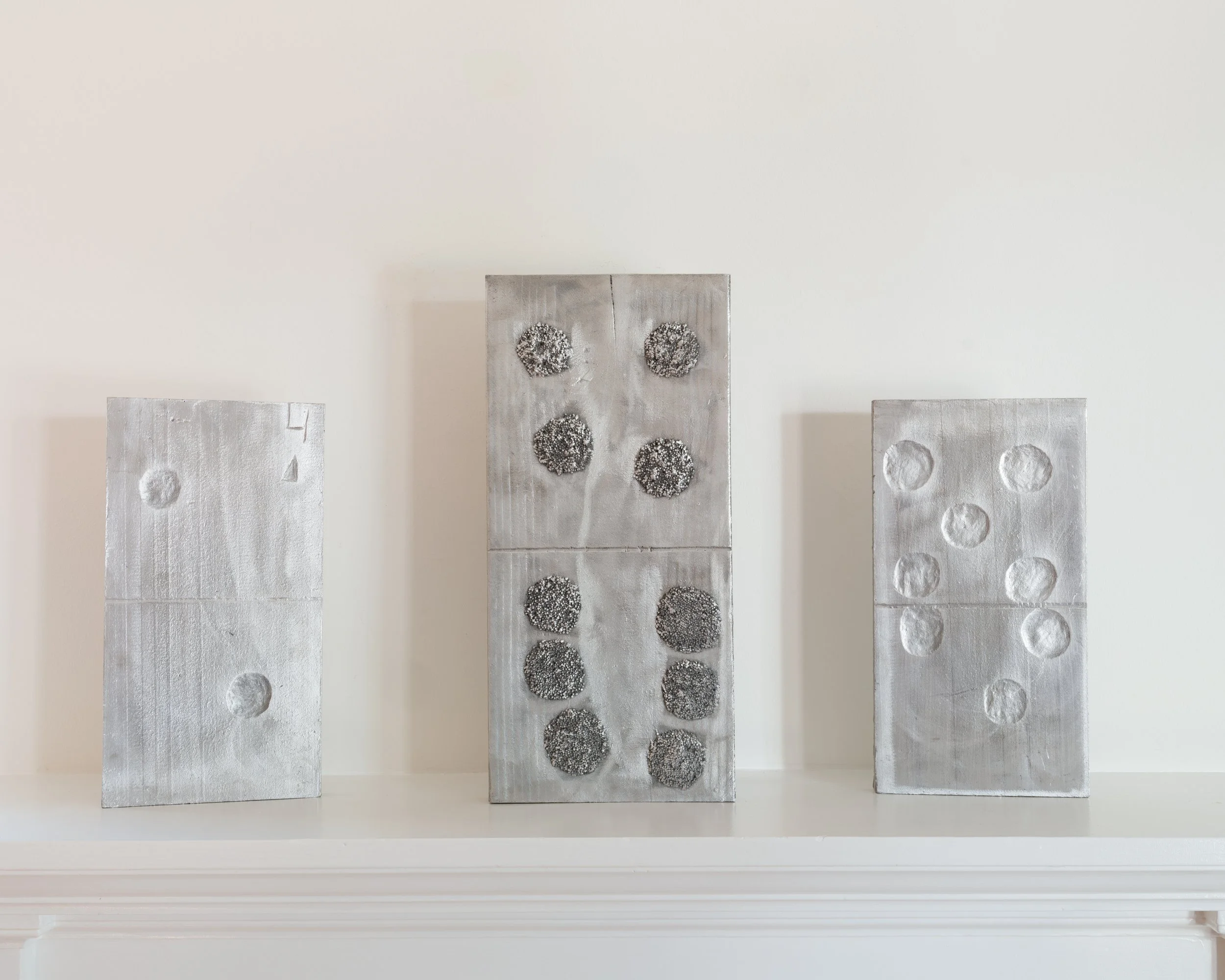 Zenobia Lee 
"Aluminum Domino II," 2026 Cast aluminum 15 x 8 x 1 in (38 x 20 x 3 cm), "Aluminum Domino III," 2026 Cast aluminum 20 x 9 x 1 3/4 in (51 x 23 x 5 cm), "Aluminum Domino I," 2026 Cast aluminum 15 x 8 x 1 in (38 x 20 x 3 cm)