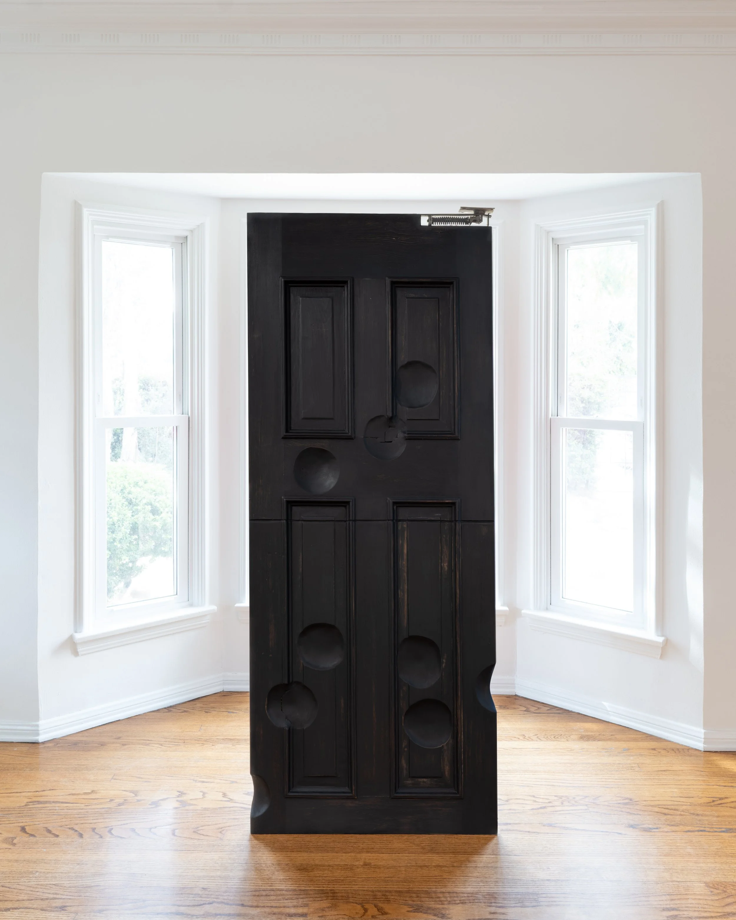 Zenobia Lee "Melancholia," 2026 Ebonized pine, steel stand 79 1/2 x 25 x 1 1/2 in (202 x 63 1/2 x 4 cm)