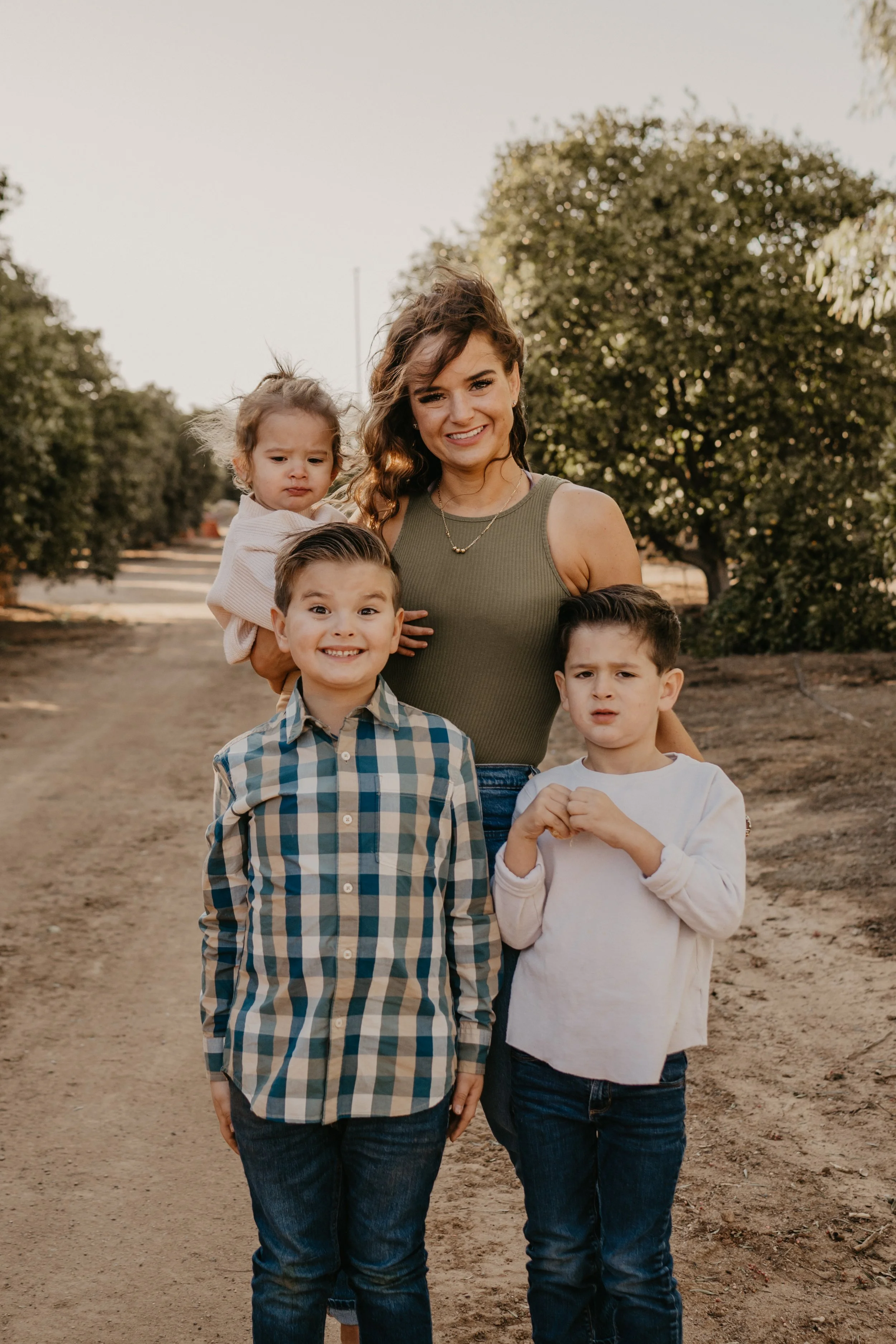 Mom and three kids poses  | Perris, California