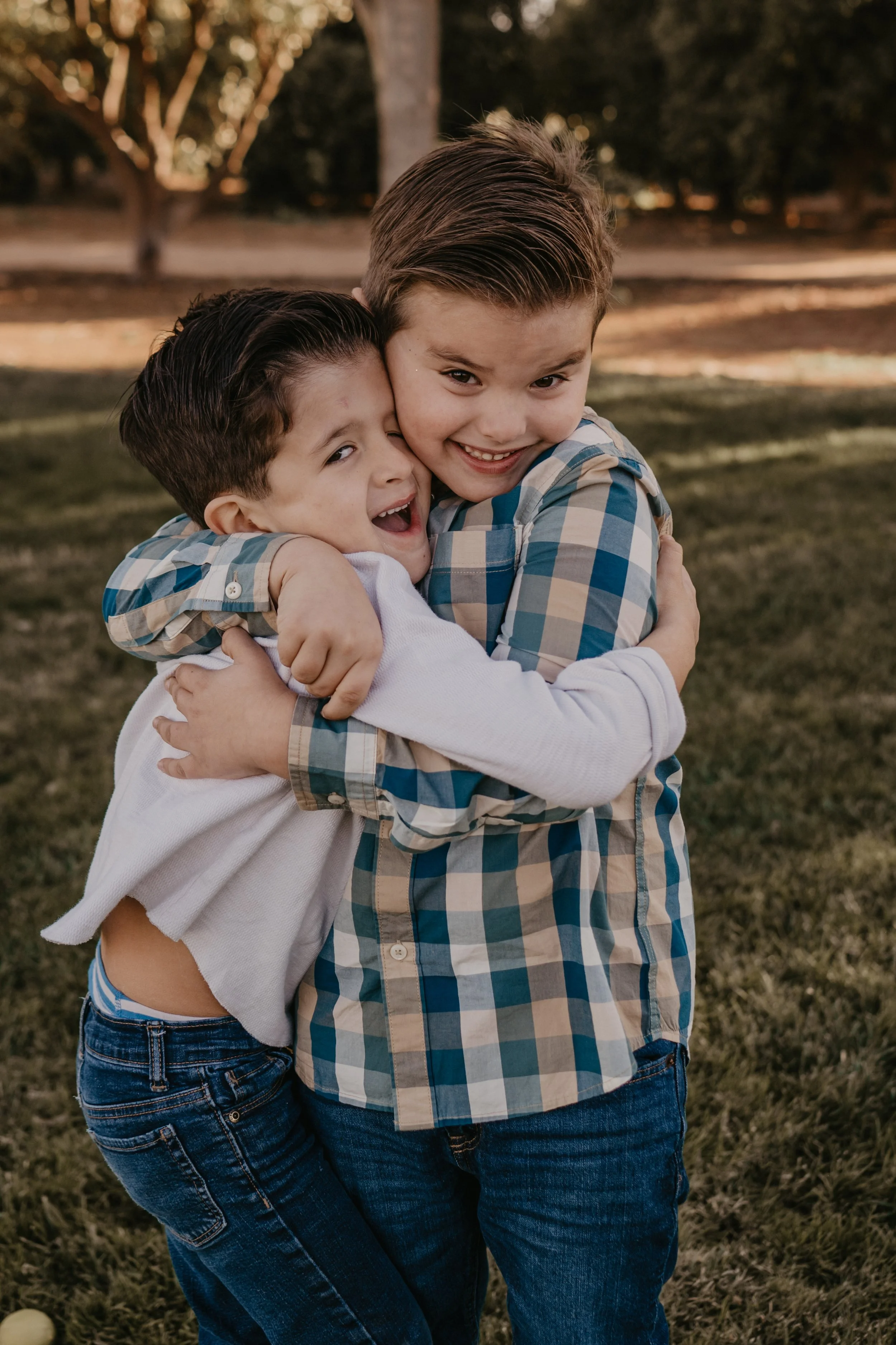 Brothers hugging for family photoshoot