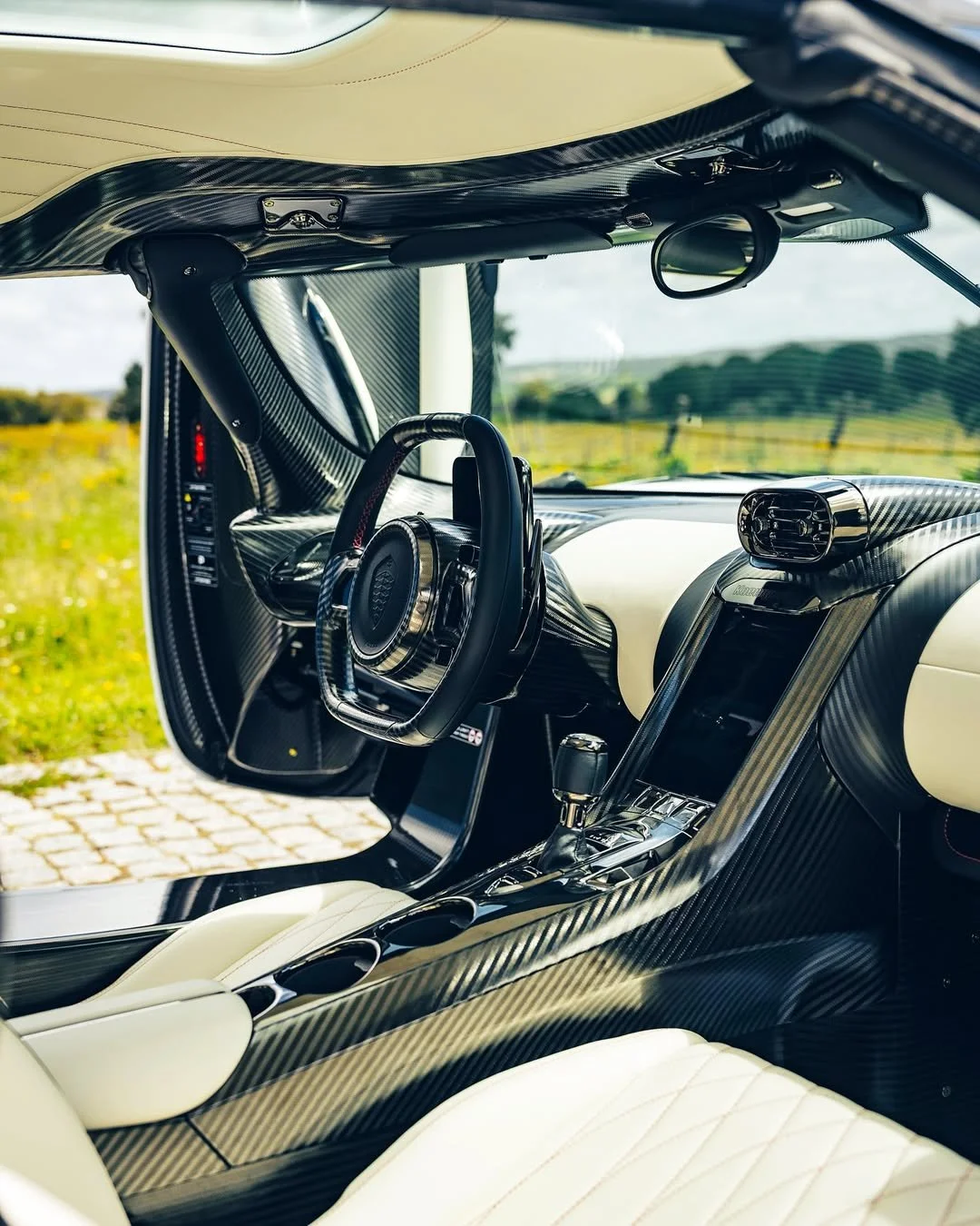 Koenigsegg Jesko Attack in Crystal White Pearl with Chilli Red Accents over Snow Leather- @supervettura latest handover and congratulations to @carinalima_racing on another epic addition   #Koenigsegg #Jesko #Attack #JeskoAttack #Superc (5).jpg