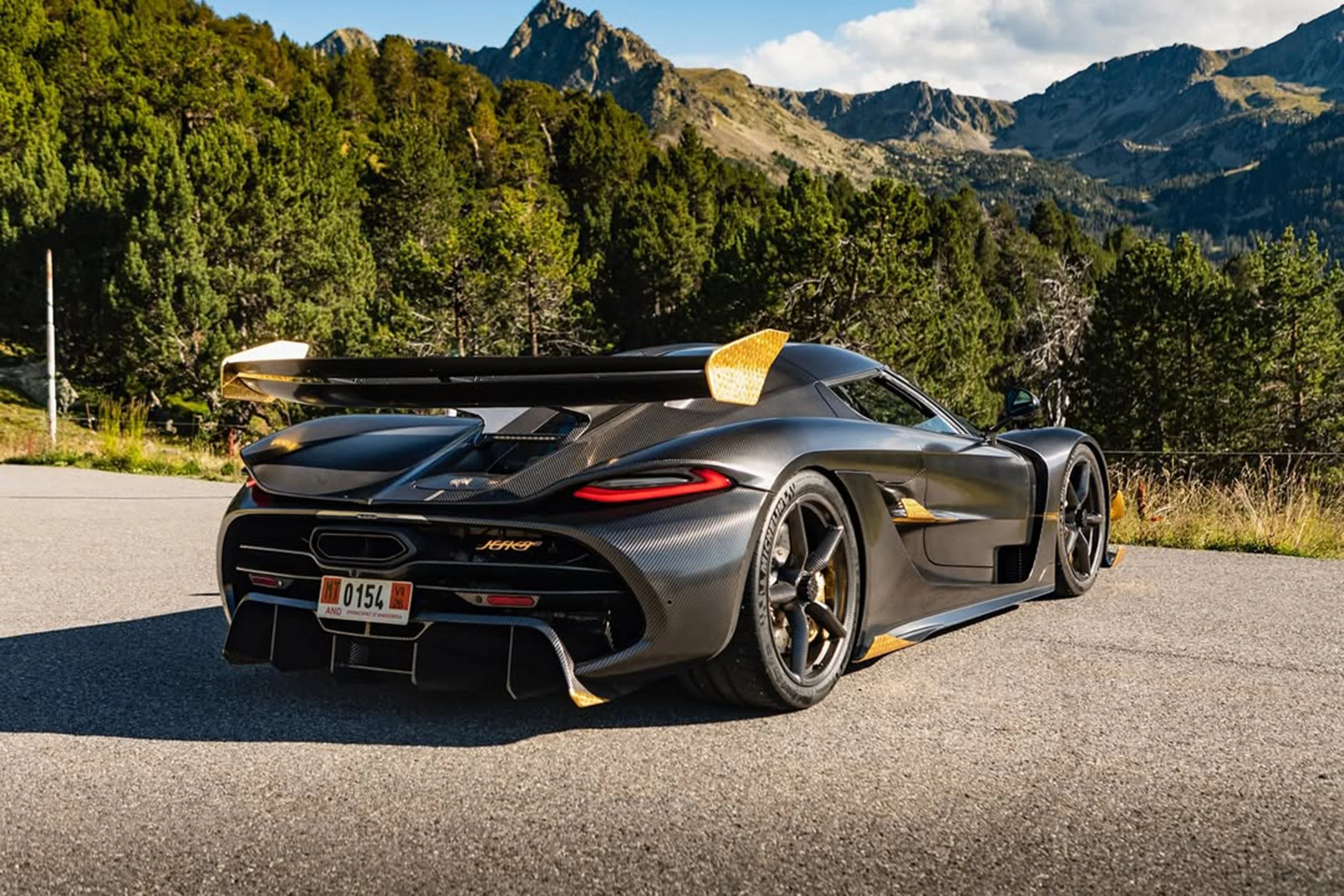 Jesko Nur Revenge SideRear Mountains.jpg