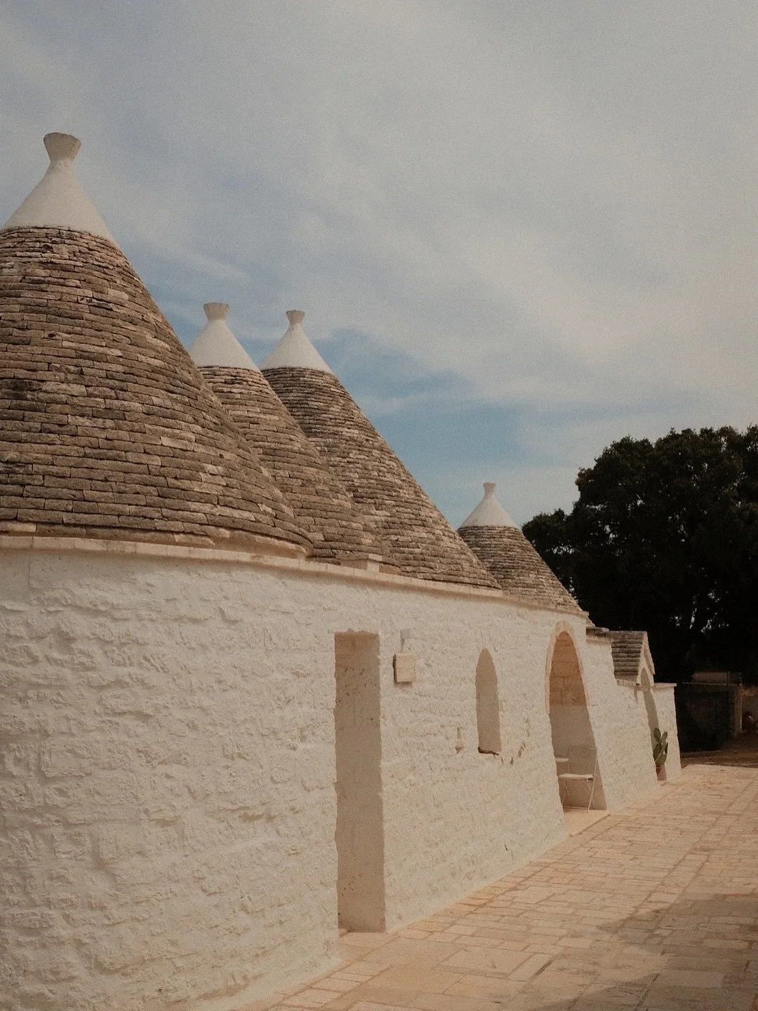 Tucked away in the olive groves  and vineyards of Locorotondo, Puglia &mdash; the trulli felt like something out of a fairytale. Every destination has its own version of &lsquo;home,&rsquo; and there, its limestone walls and cone-shaped roofs built b