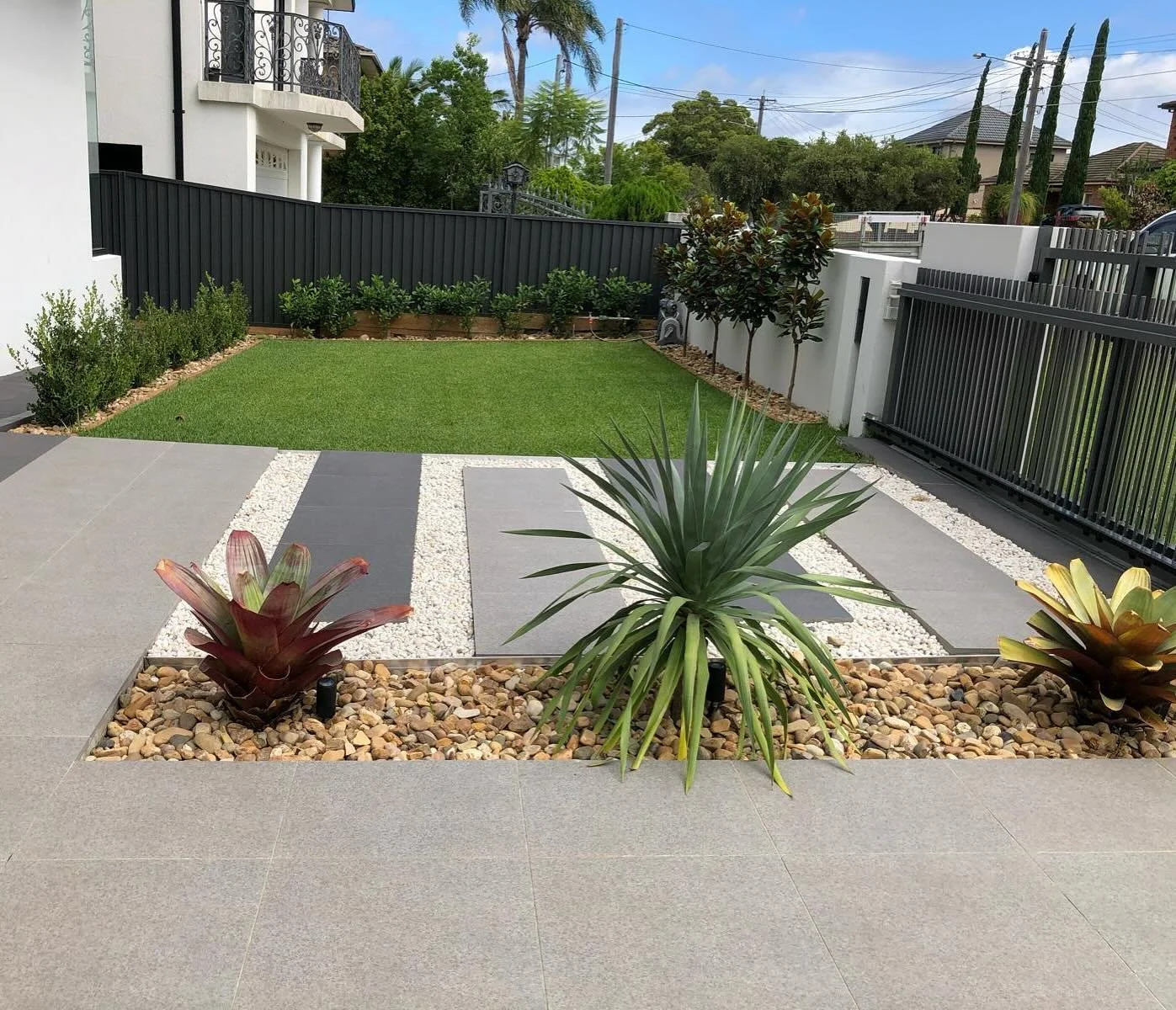 First Impressions Count 💯 
A Curated Combination of Plants, 3D Aluminium Slate Fence + Electric Gate, Colour Bond Fence, Concreting, Paving and Turf for Our Client&rsquo;s New Build. 

#sydneylandscaper #sydneylandscaping #landscaping #landscapecons