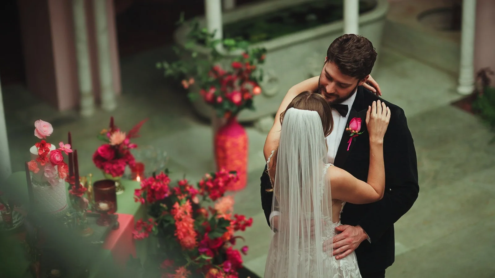 Couple close-up with natural emotion and fashion-led styling during their romantic first dance.