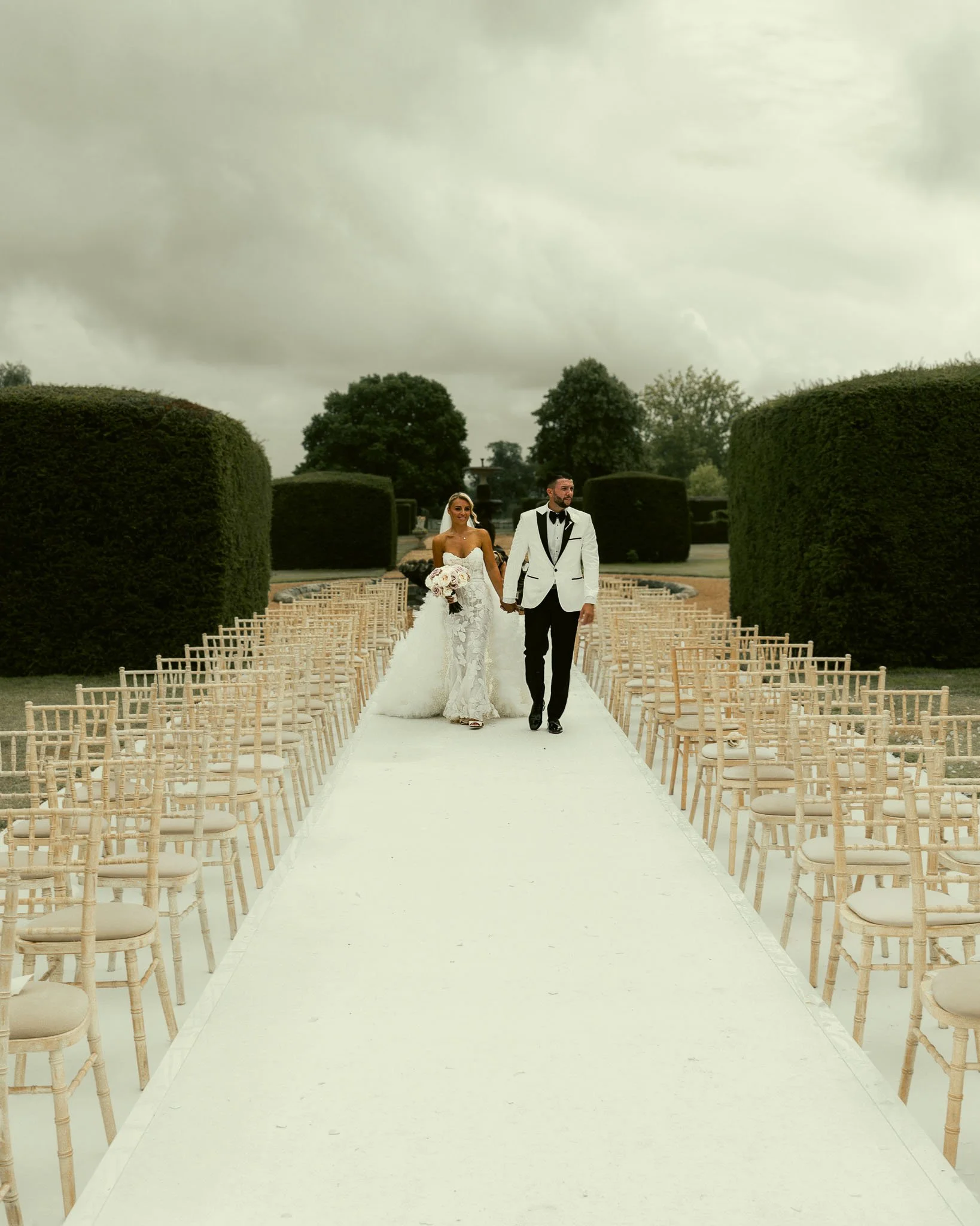 A luxury Eastwell Manor wedding, filmed and photographed by Kent wedding videographer Luke Batchelor Productions.