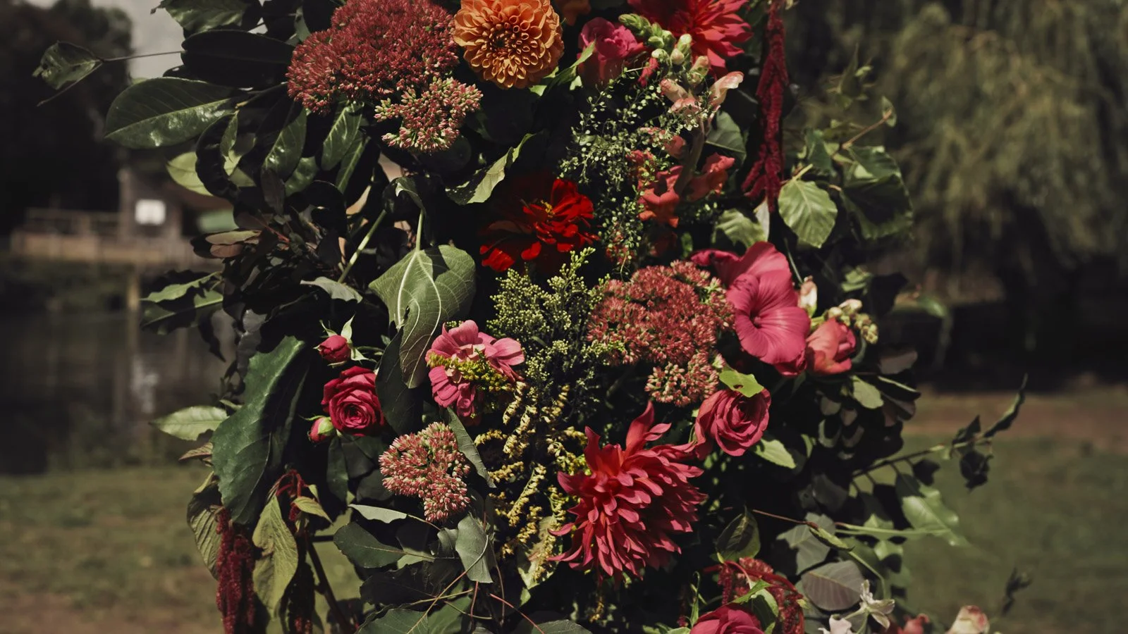 Details and candid scenes from a colourful riverside wedding video at an Oxfordshire estate beside the River Thames.