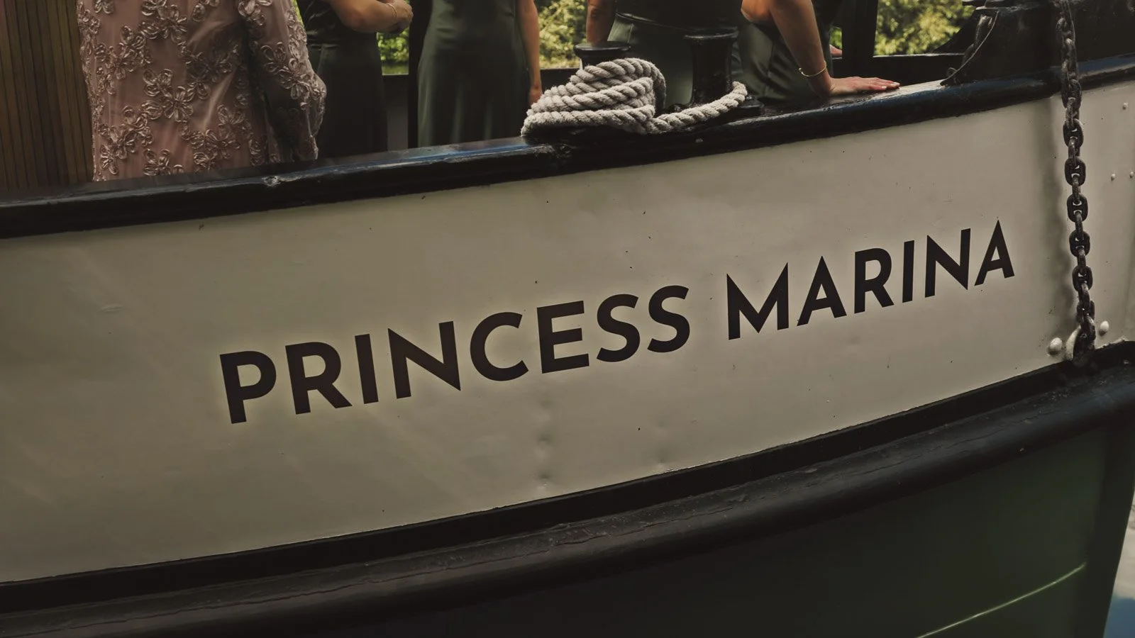 Details and candid scenes from a colourful riverside wedding video at an Oxfordshire estate beside the River Thames.