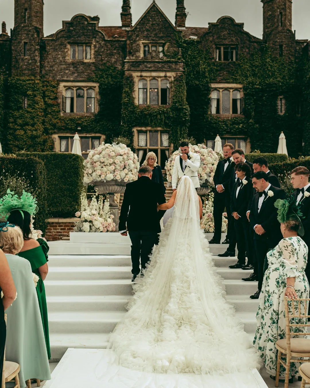 A high end wedding photography and videography team capture an outdoor wedding ceremony in Kent.