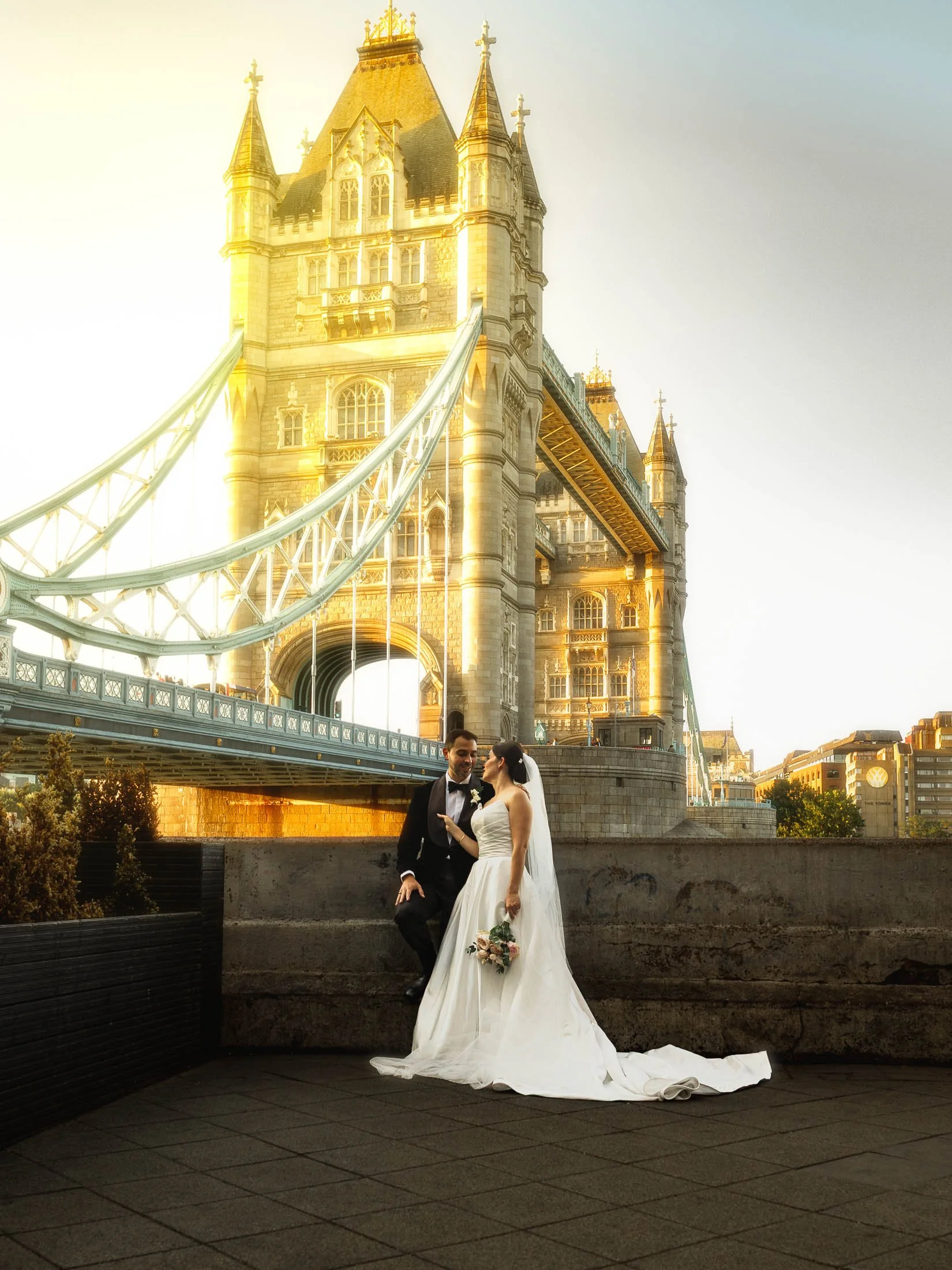 Romantic London wedding portraits with a bride and groom by Tower Bridge.