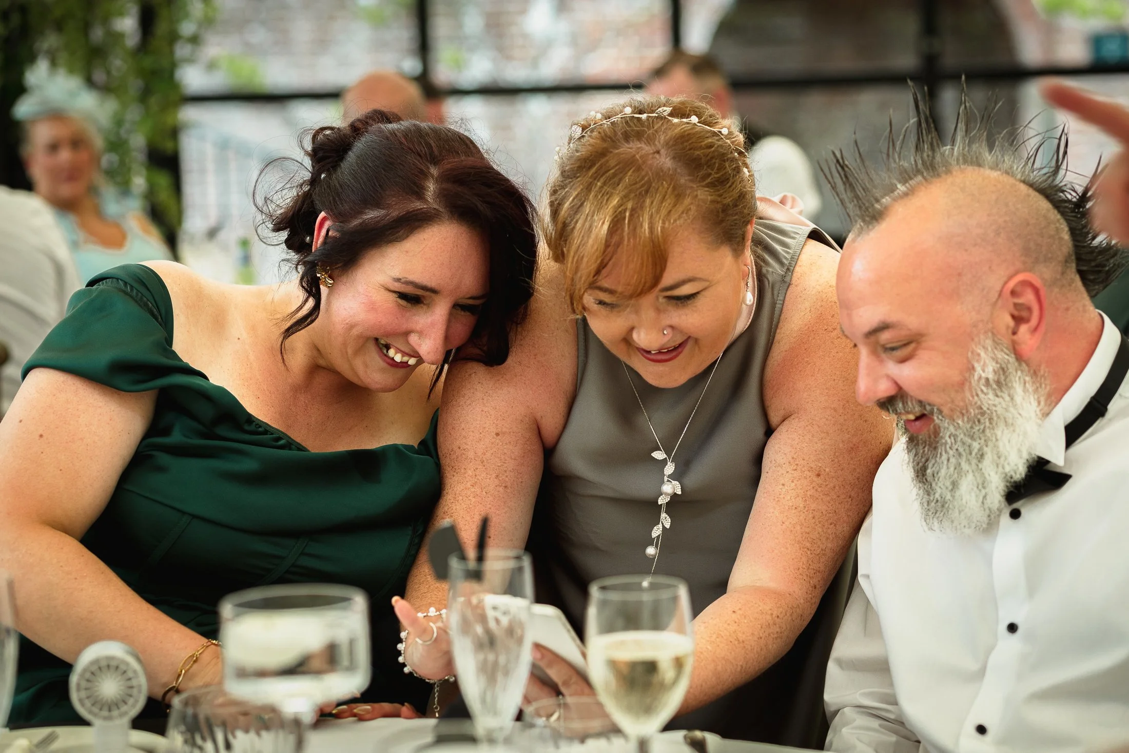 A candid guest reaction shot during a wedding reception.