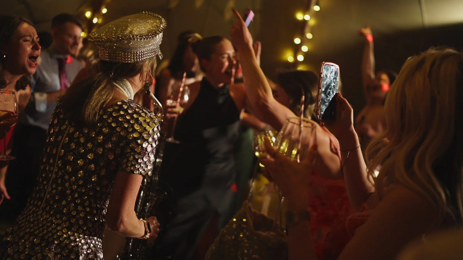 Candid moments from a colourful riverside wedding on the River Thames at an Oxfordshire country estate.