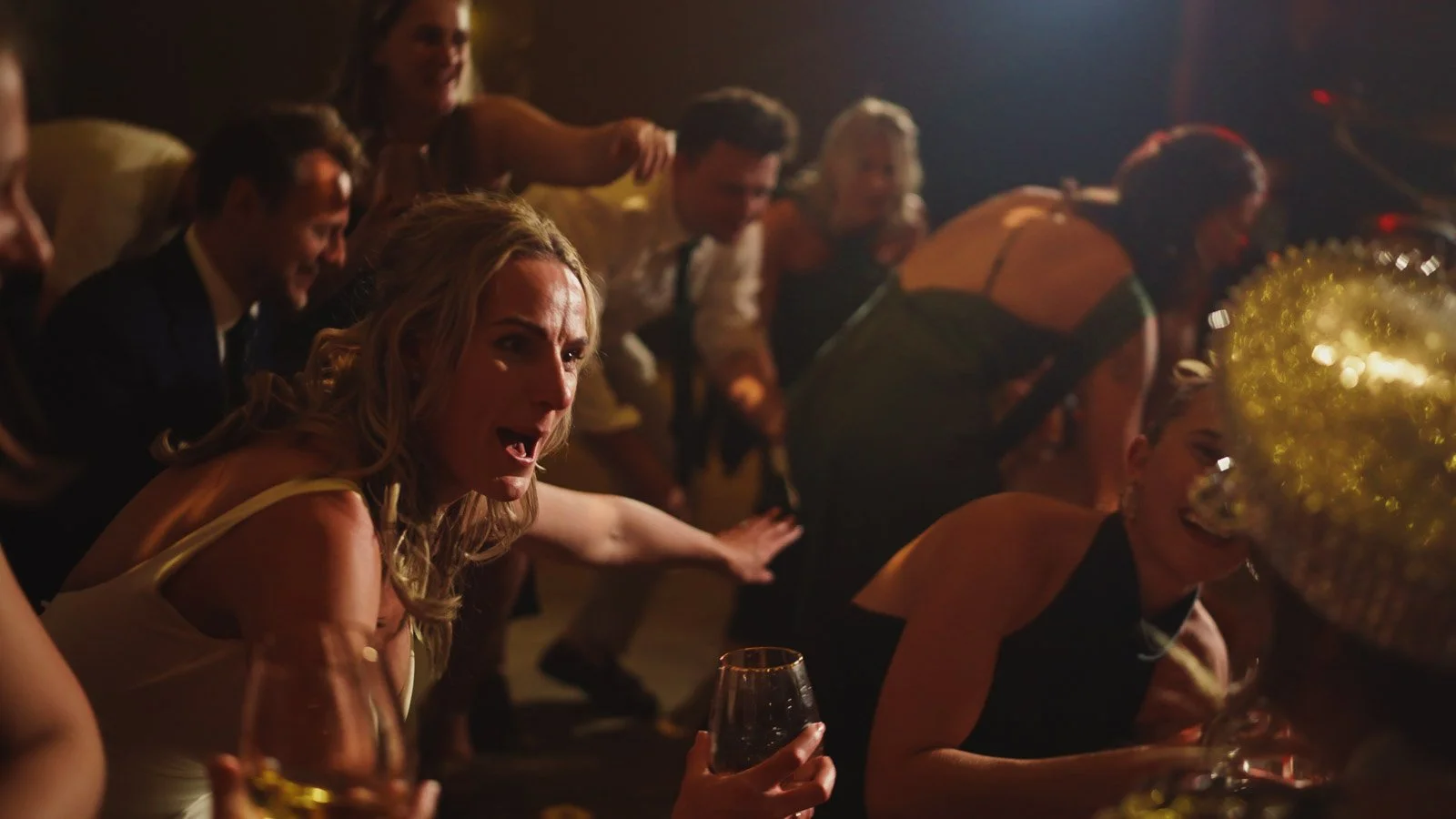 Candid moments from a colourful riverside wedding on the River Thames at an Oxfordshire country estate.