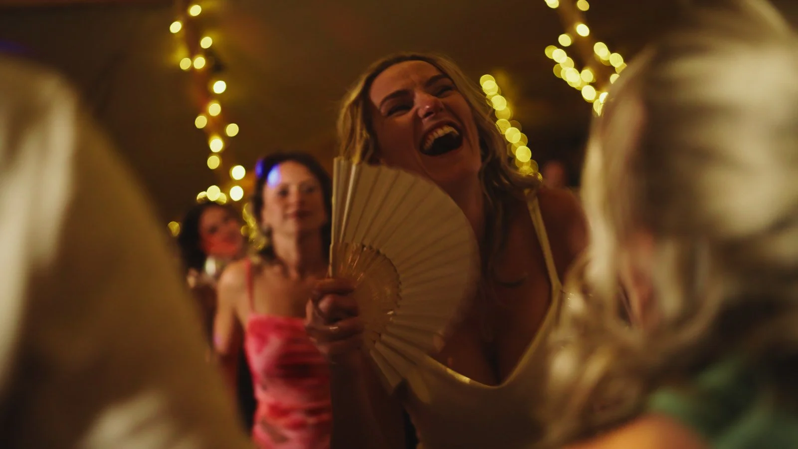 Candid moments from a colourful riverside wedding on the River Thames at an Oxfordshire country estate.