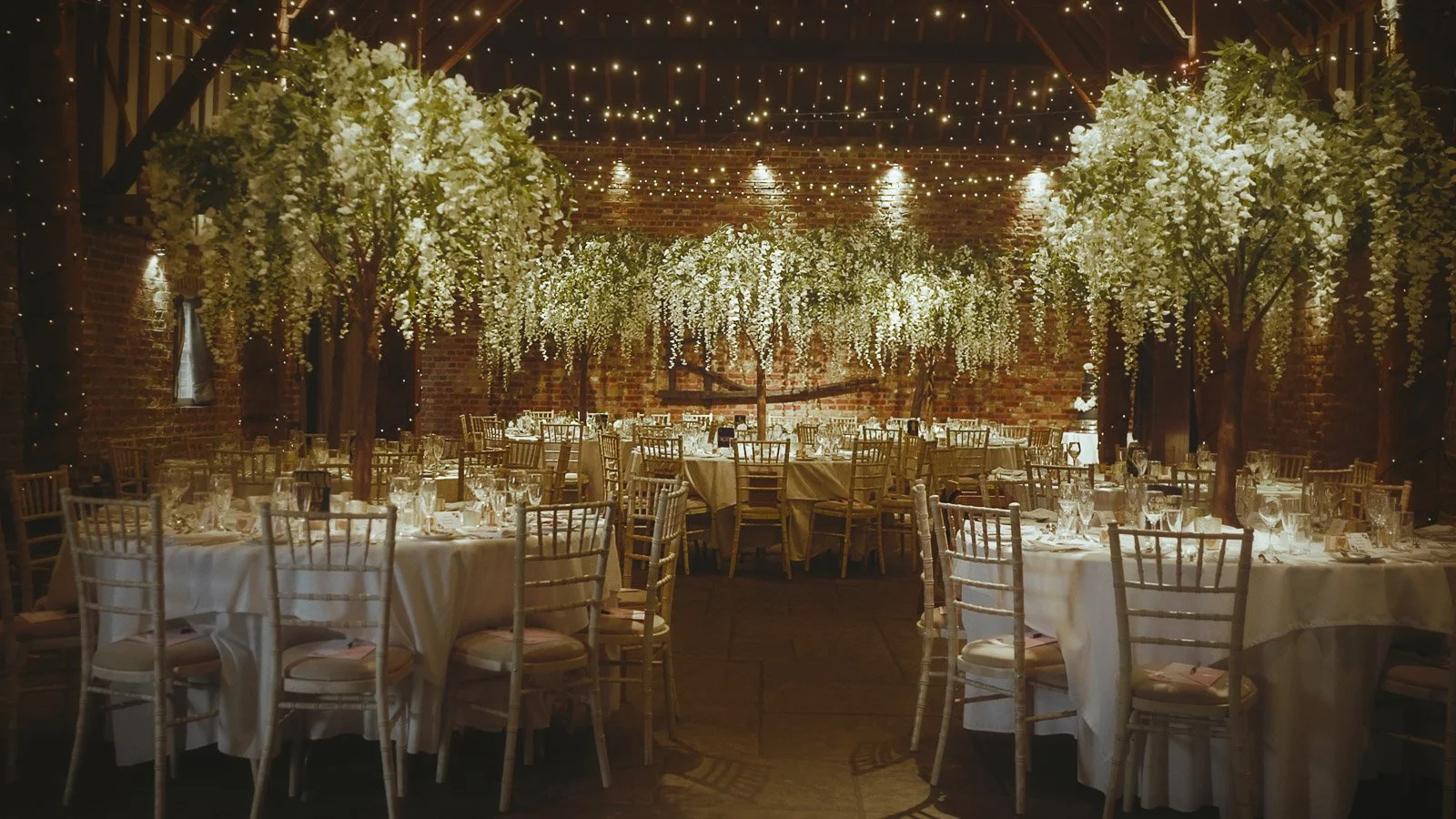 Barn reception styling captured at Cooling Castle Barn wedding venue