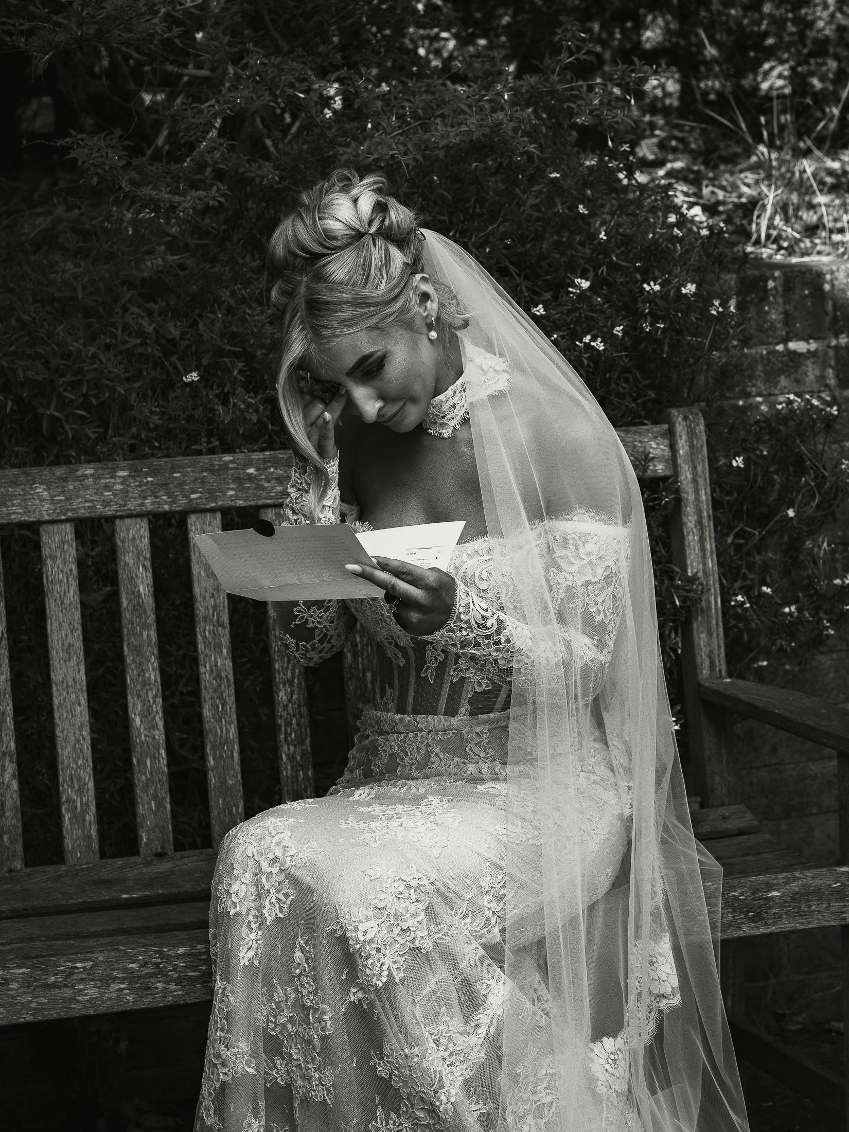 Emotional moment as a bride reads a letter written by the groom at The Orangery Maidstone.