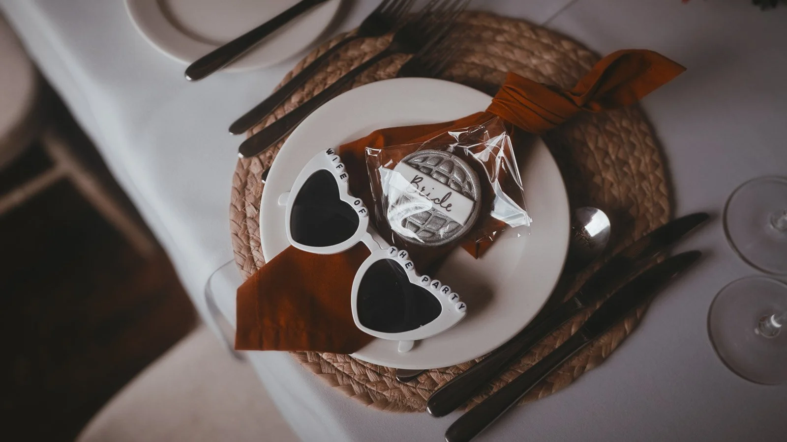 Editorial shot of a table scape and wedding decor setup at a colourful Winters Barns wedding in Kent.