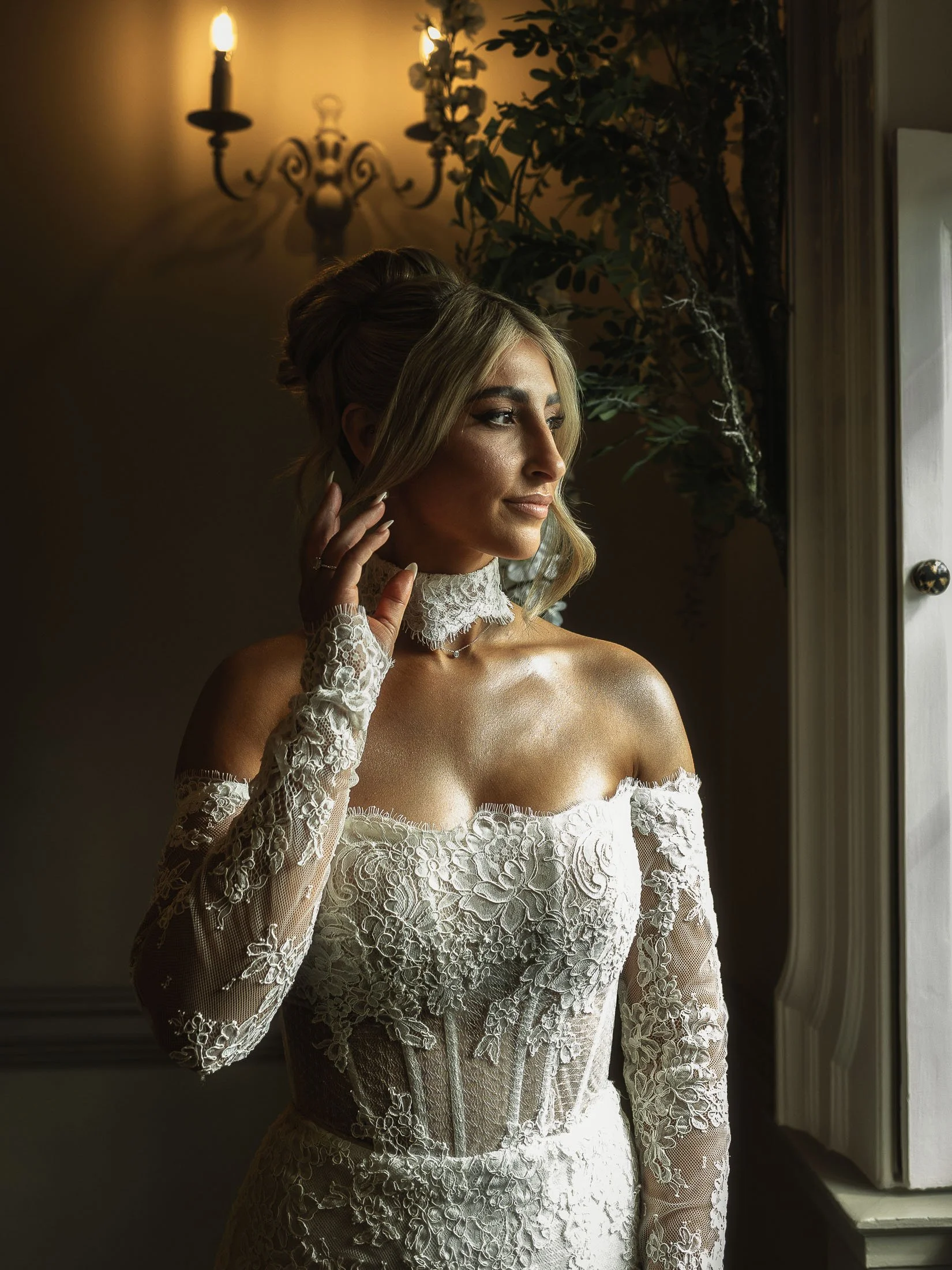 A fine art bridal portrait in natural light in the Wisteria Suite at The Orangery Maidstone wedding venue in Kent.