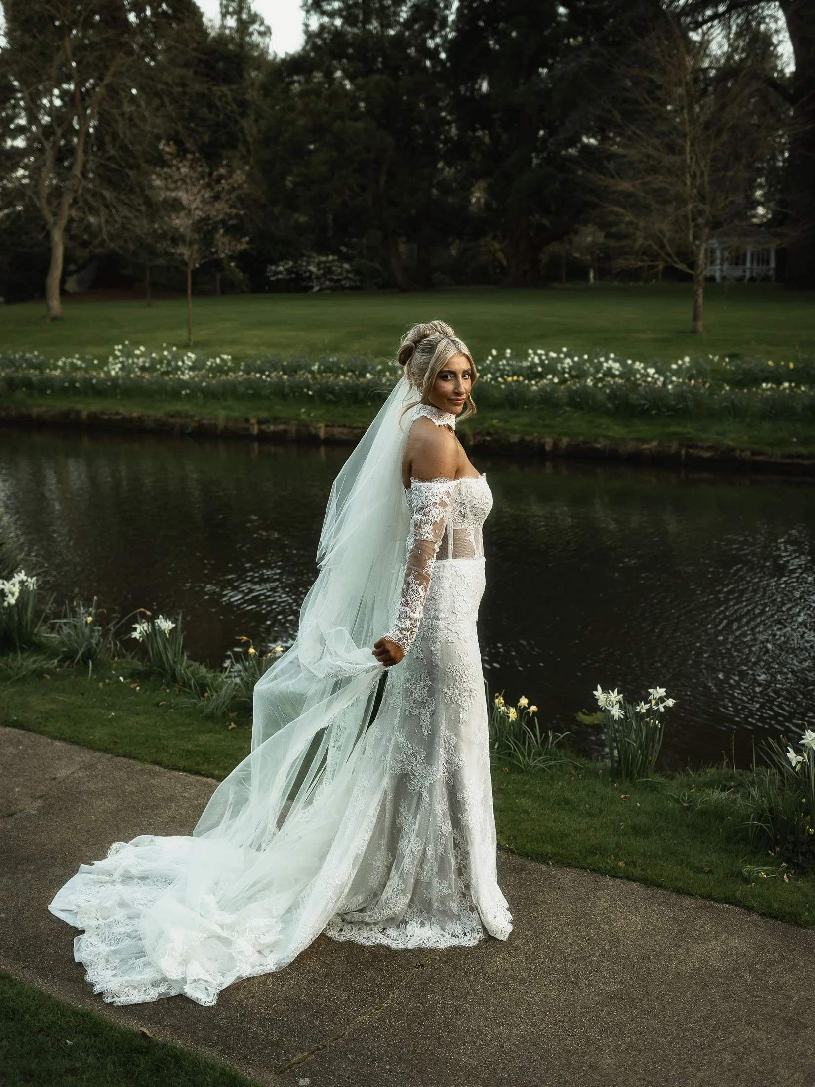 Editorial wedding photography and videography at The Orangery Maidstone with outdoor, natural light bride portraits.