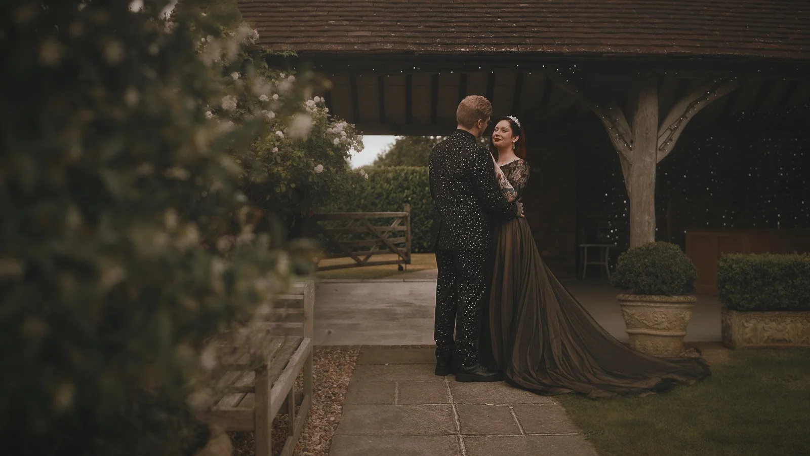 Wide portrait of couple in countryside setting for Winters Barns wedding video