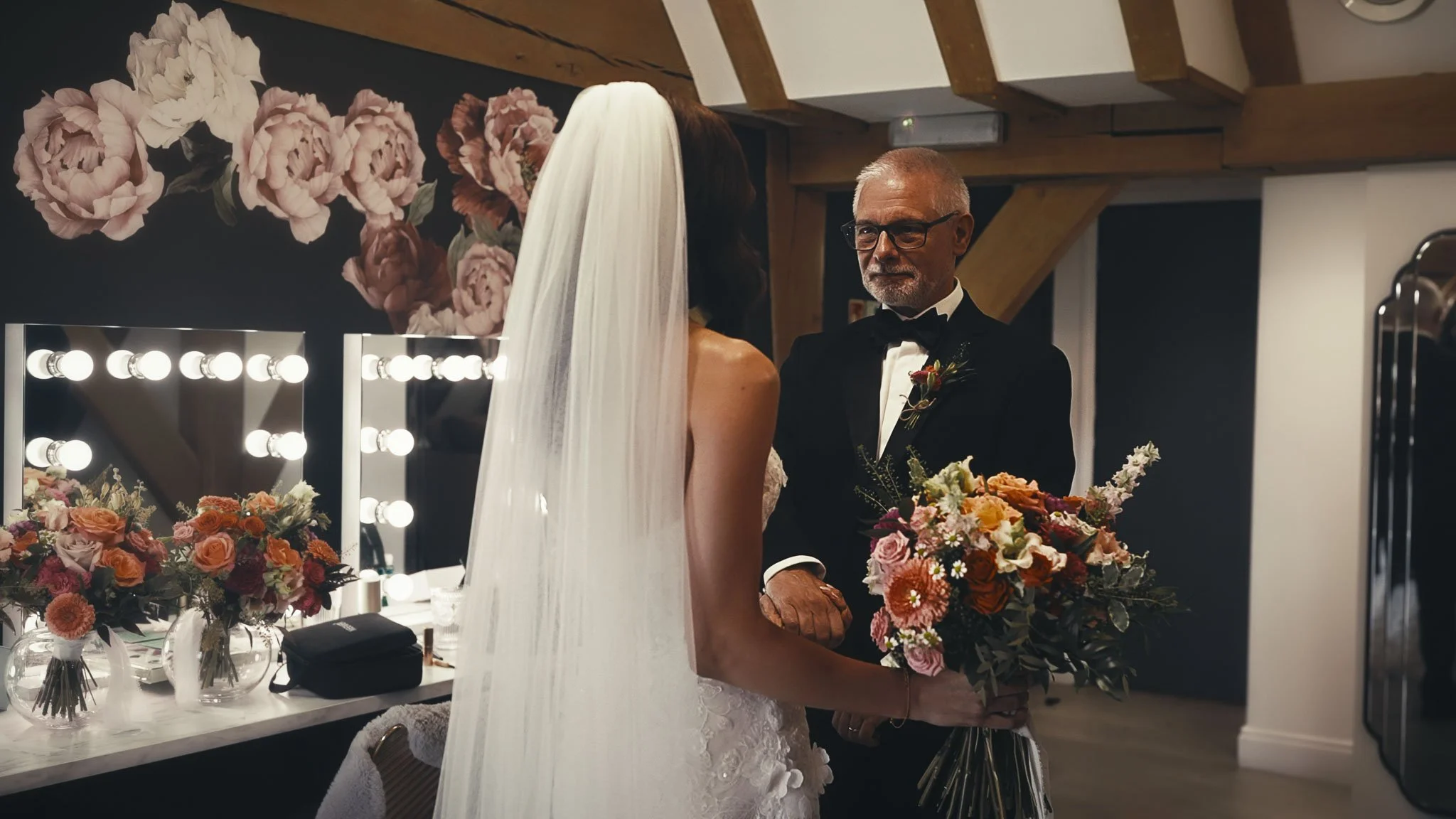 Wedding morning bridal preparations and detail shots from a black tie wedding video shot at The Old Kent Barn.