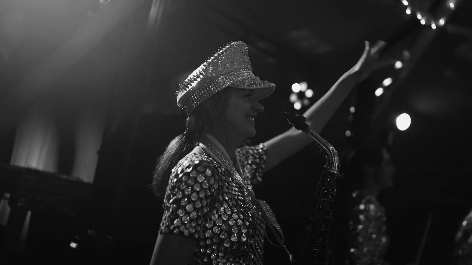 Candid moments from a colourful riverside wedding on the River Thames at an Oxfordshire country estate.