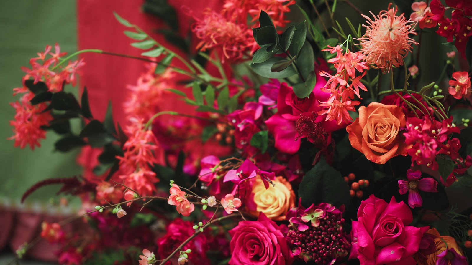 Pink and red wedding colour palette and floral design.
