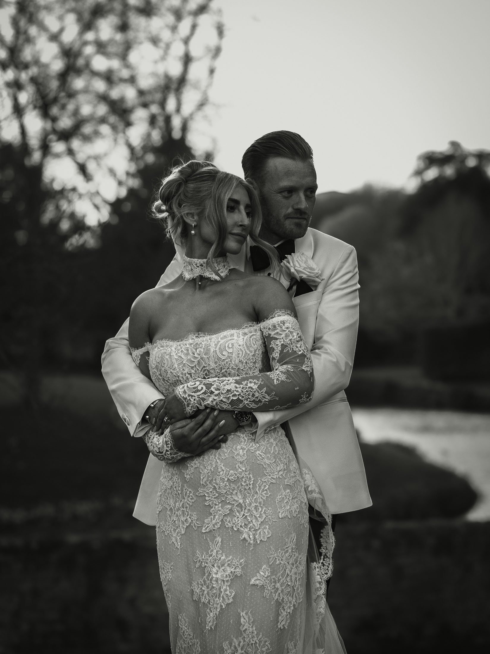 Black and white editorial wedding portrait during golden hour at The Orangery Maidstone.