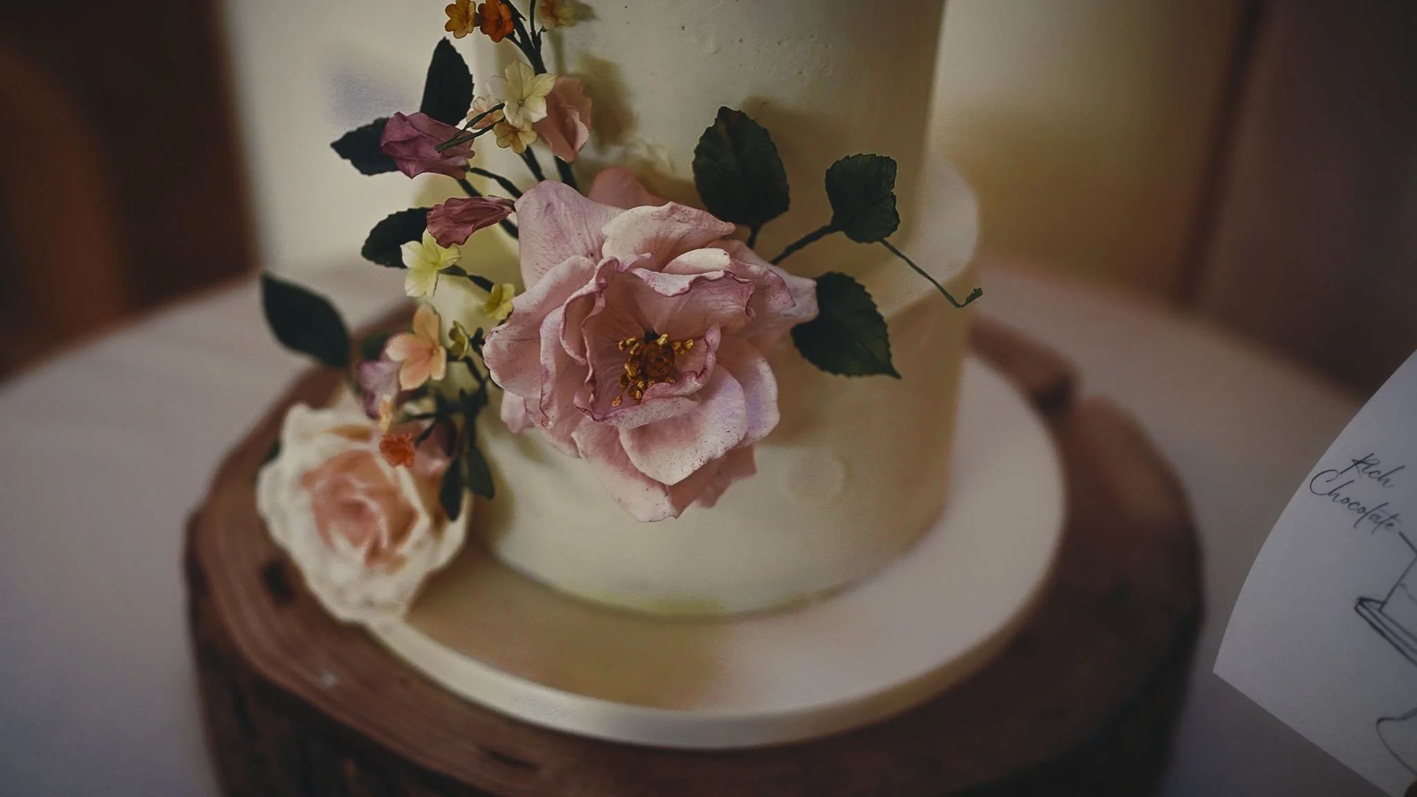 Wedding morning bridal preparations and detail shots from a black tie wedding video shot at The Old Kent Barn.