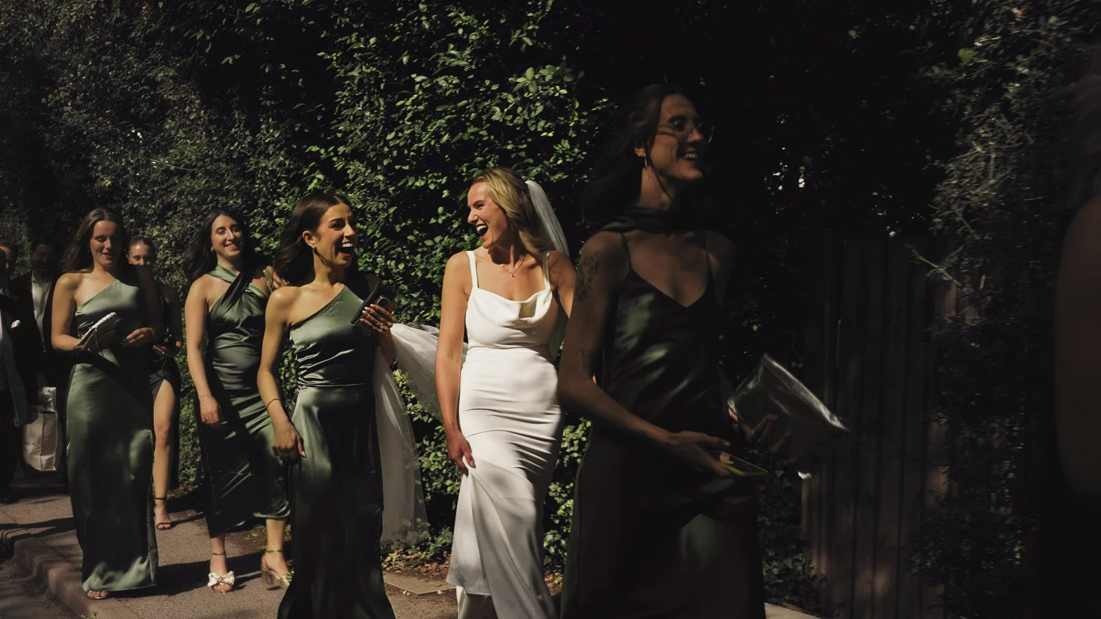 Candid moments from a colourful riverside wedding on the River Thames at an Oxfordshire country estate.