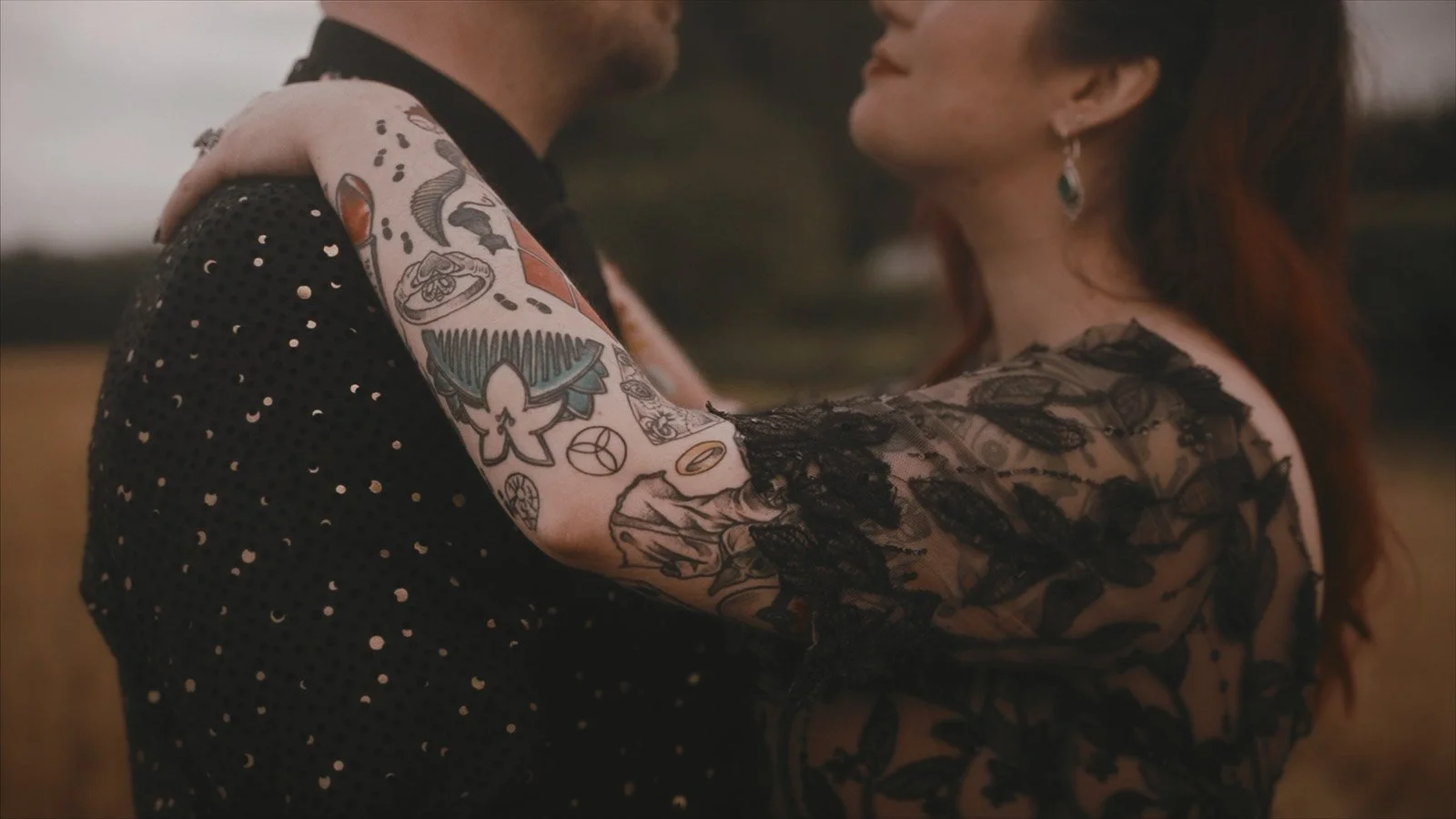 Alternative gothic wedding couple portrait at Winters Barns with black lace styling